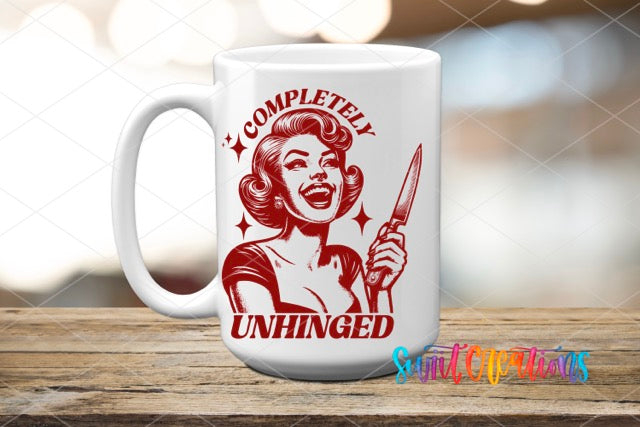 a coffee mug with a picture of a woman holding a knife