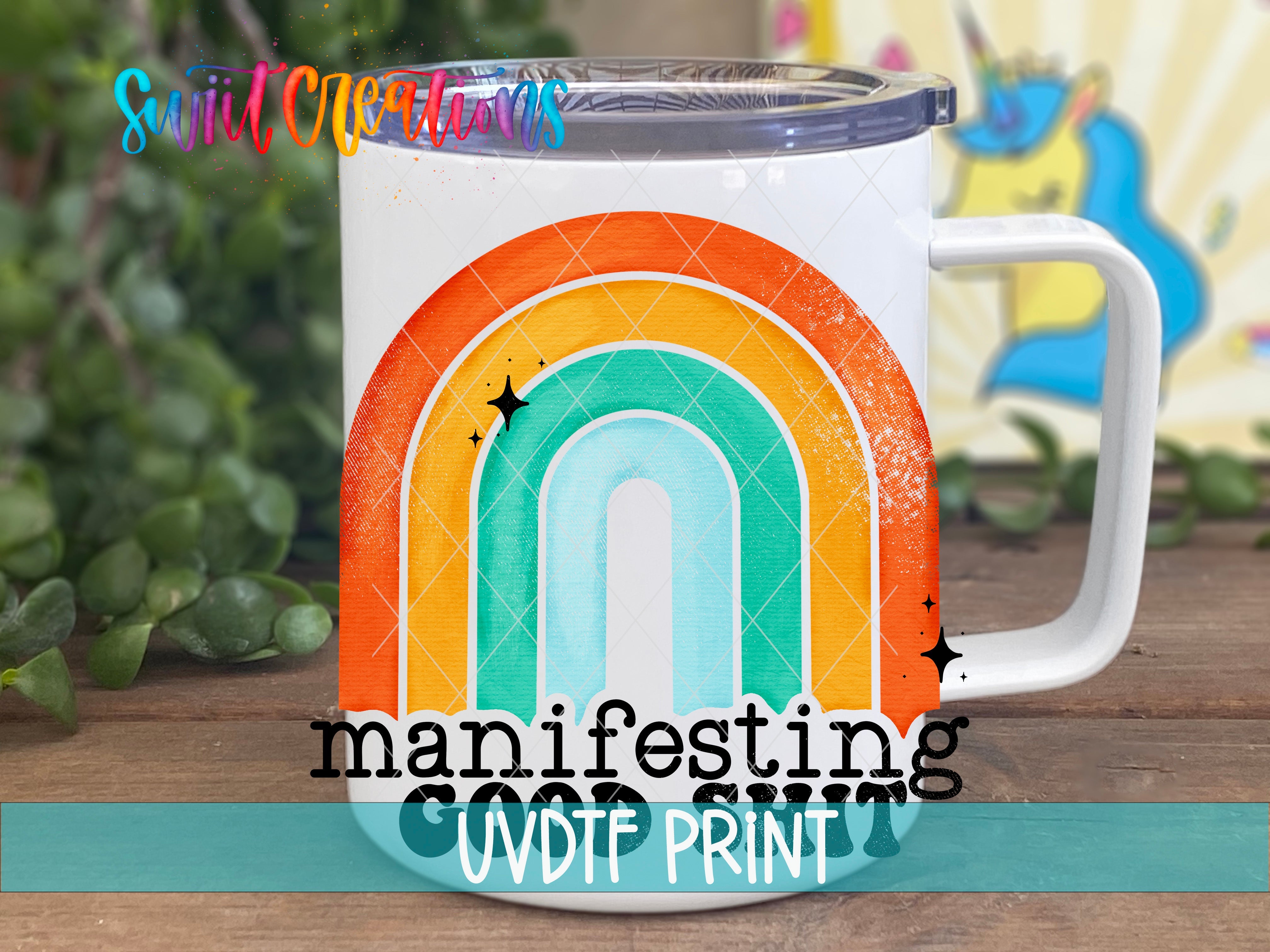 a coffee mug with a rainbow painted on it