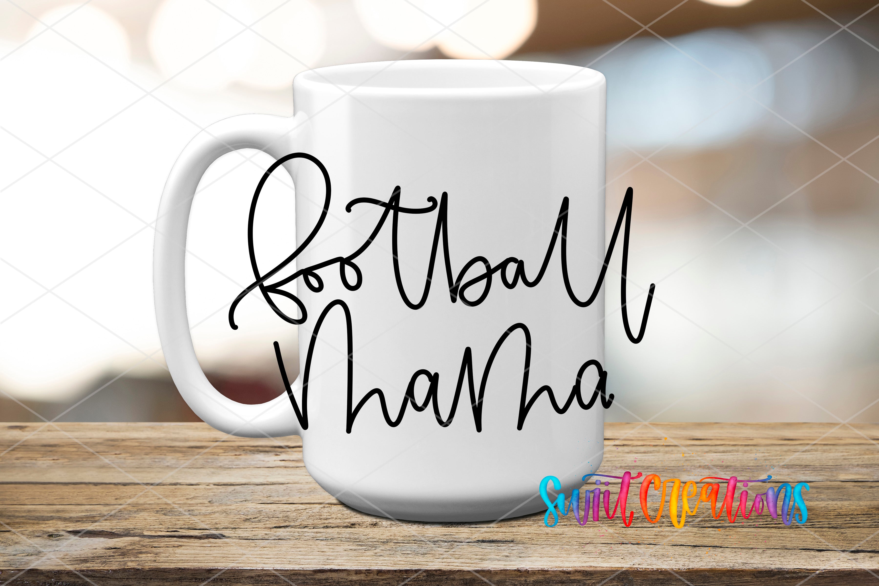 A white mug with the text "Football Mama" written on it, placed on a wooden surface.