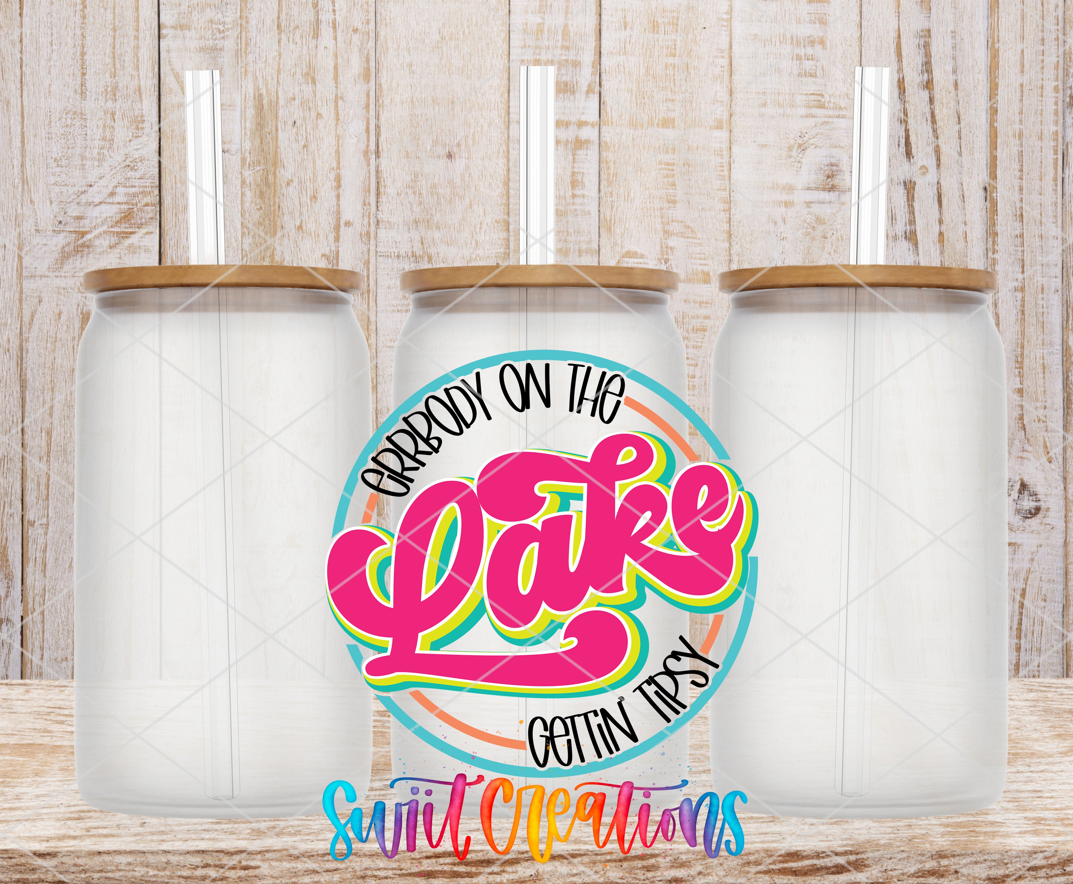 three clear glass jars with lids, arranged in a row against a wooden background. The jars have straws attached to their lids. The central focus of the image is a colorful, stylized text that reads "BARBODY ON THE LAKE GETtin Tippy", which is a playful and creative design element.