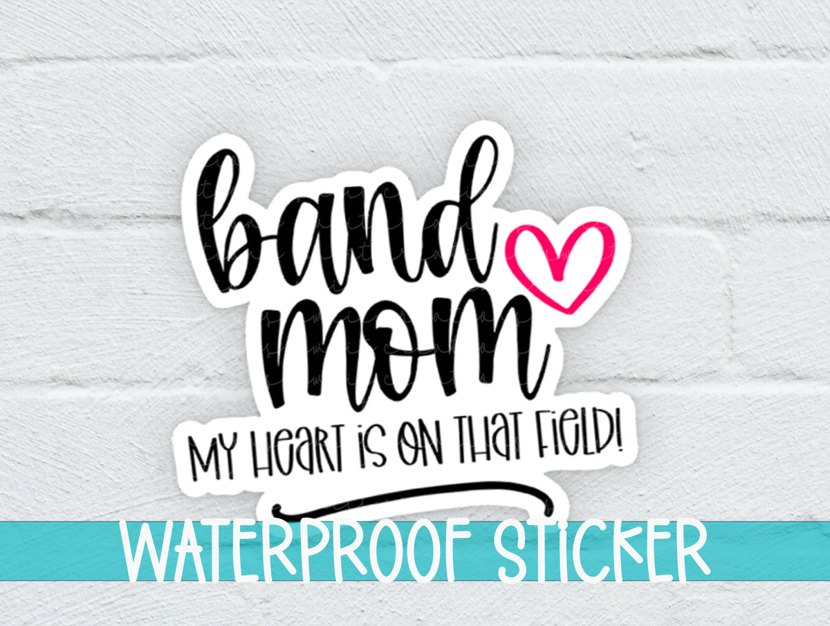 a sticker that says band mom, my heart is on that field