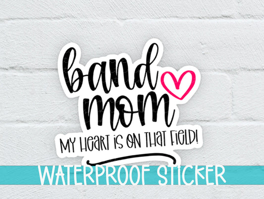a sticker that says band mom, my heart is on that field