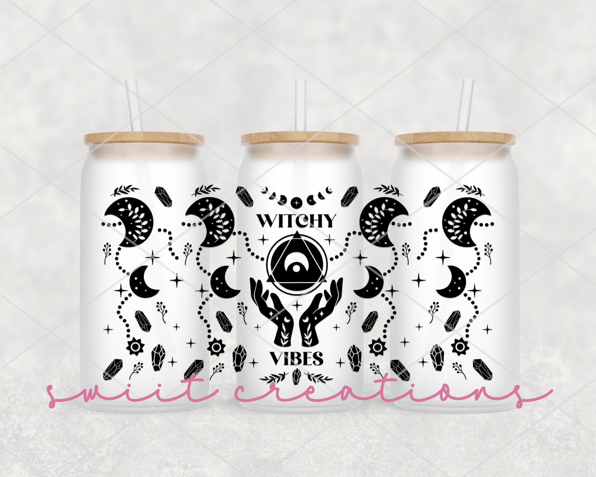 a couple of white cans with black designs on them