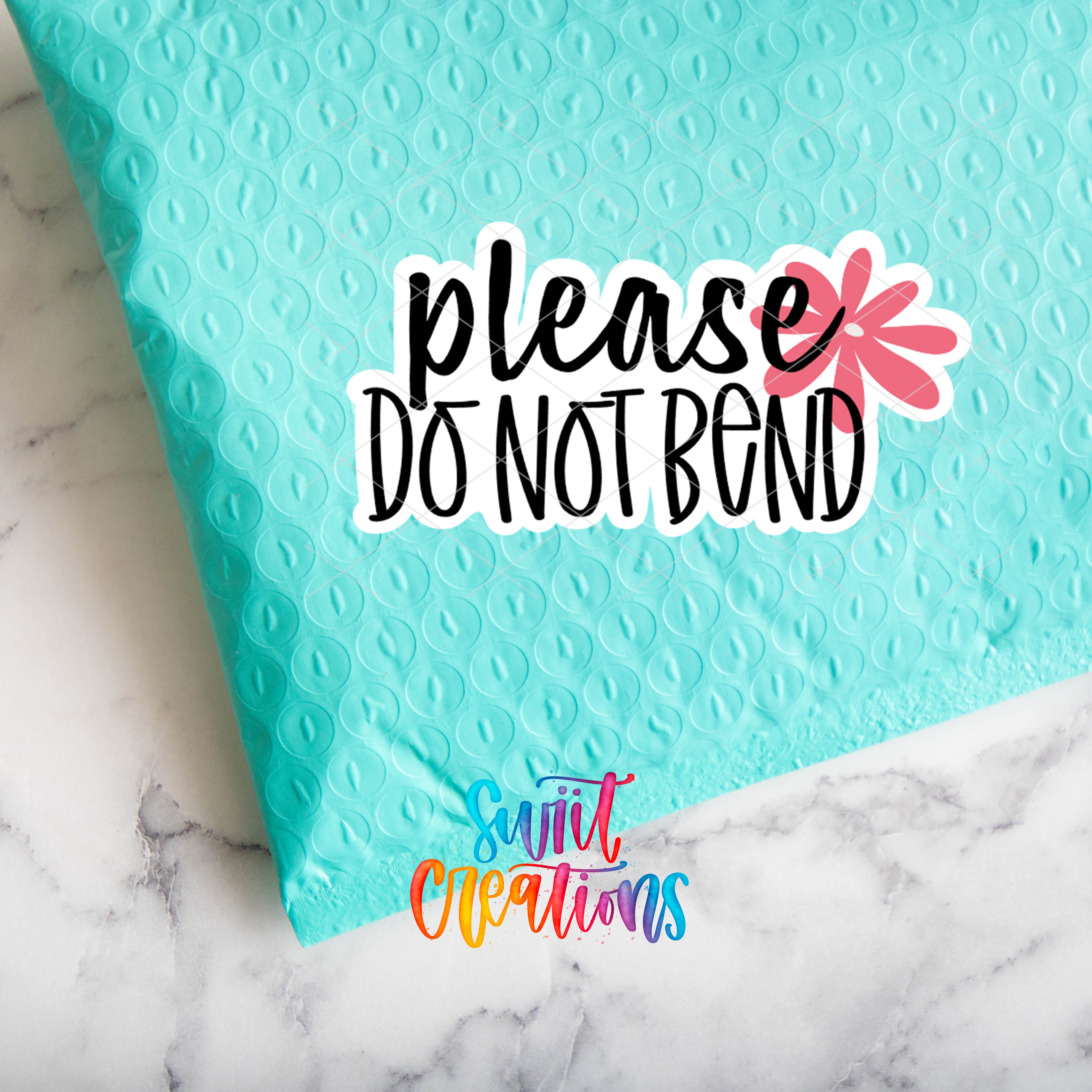 a close up of a piece of paper with the words please do not bend
