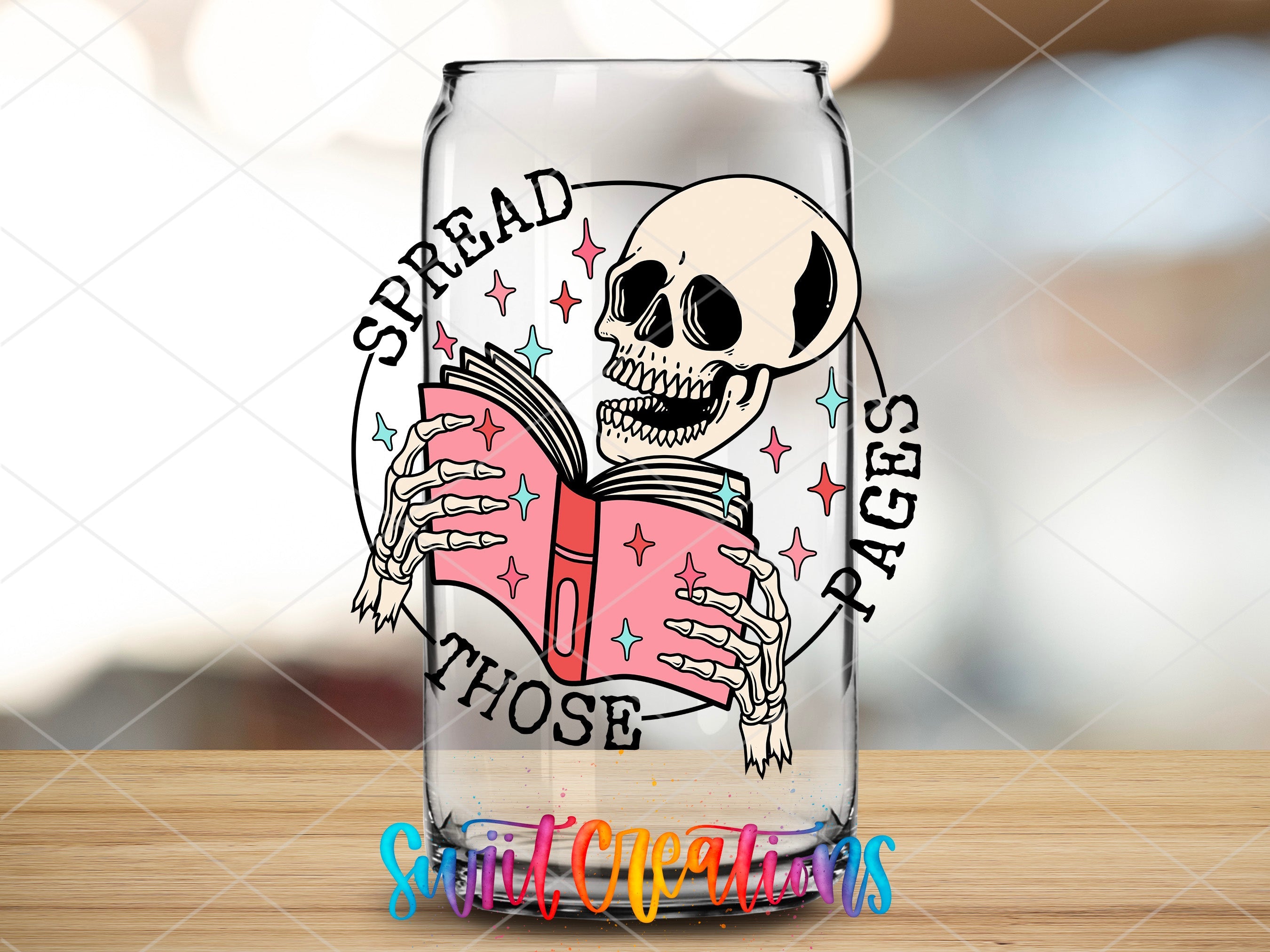 a glass with a skull reading a book