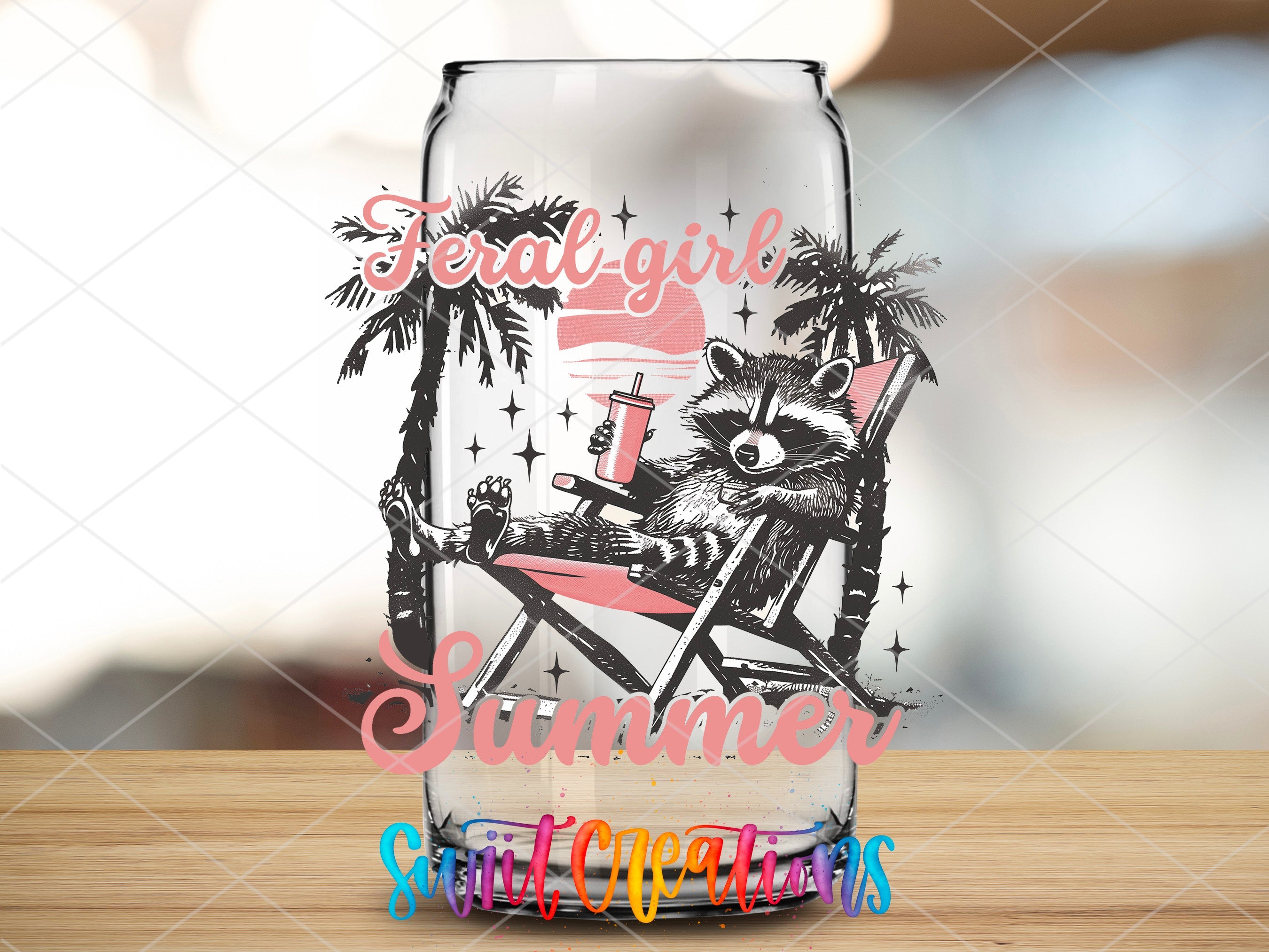 a glass with a raccoon on it sitting on a table