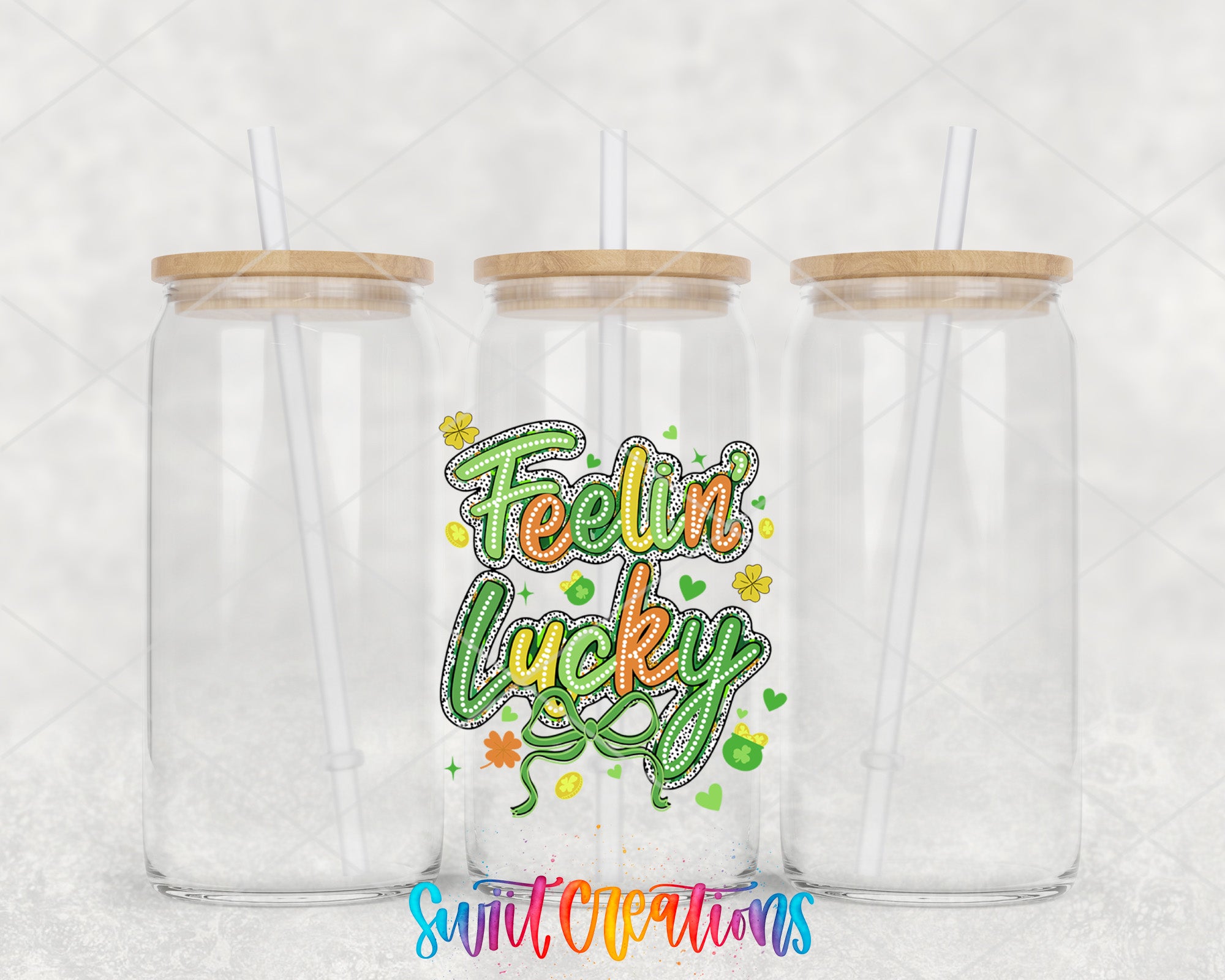 two clear tumblers with the words feelin'lucky on them