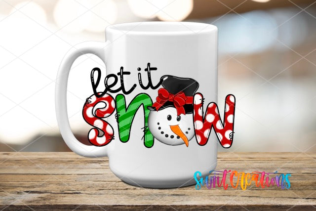 a coffee mug with the words let it snow on it