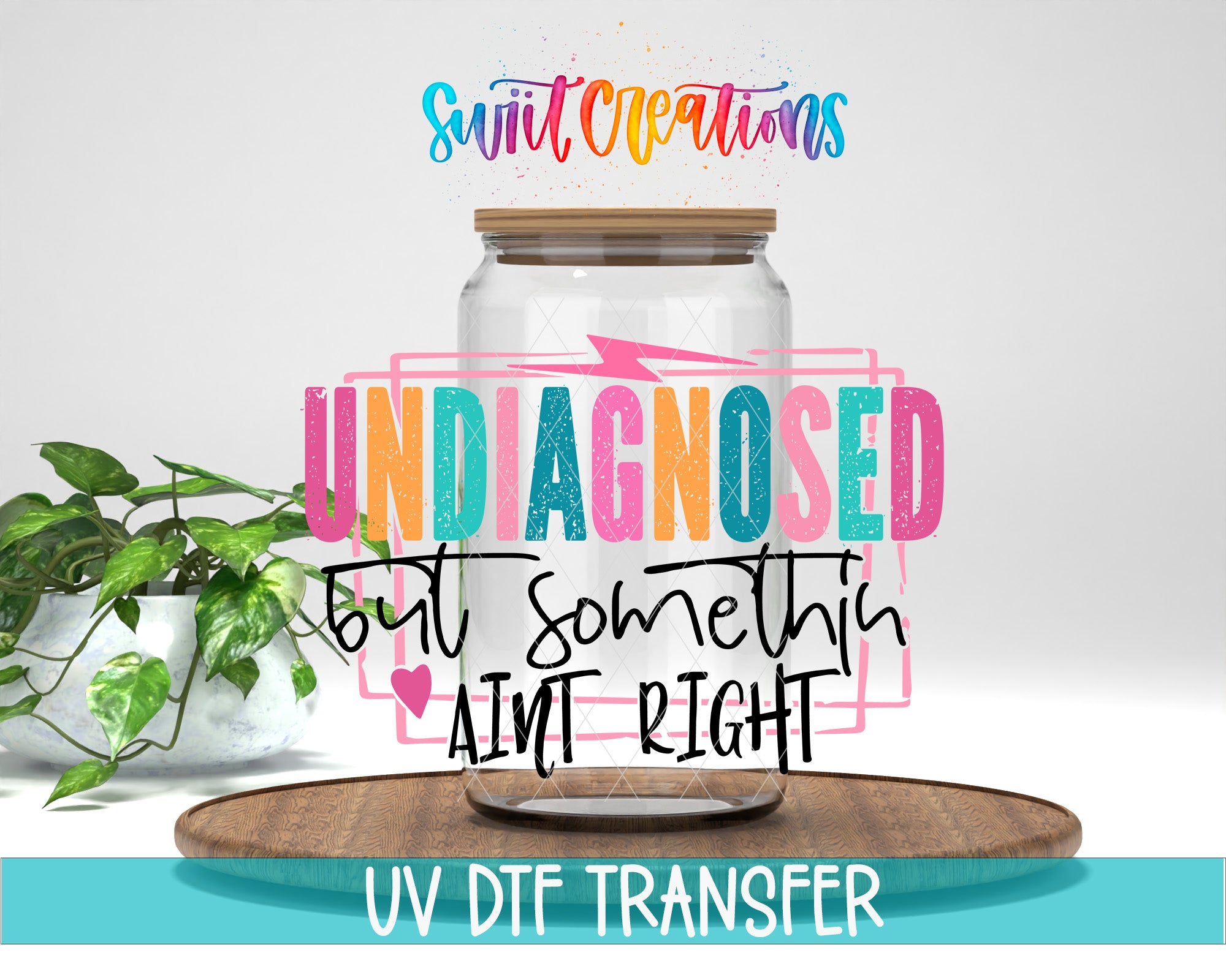 a large glass jar with a wooden lid, surrounded by a potted plant and a wooden tray. The text overlay includes the phrase "UNDIAGNOSED but something ain't right" and "UV DFT TRANSFER".