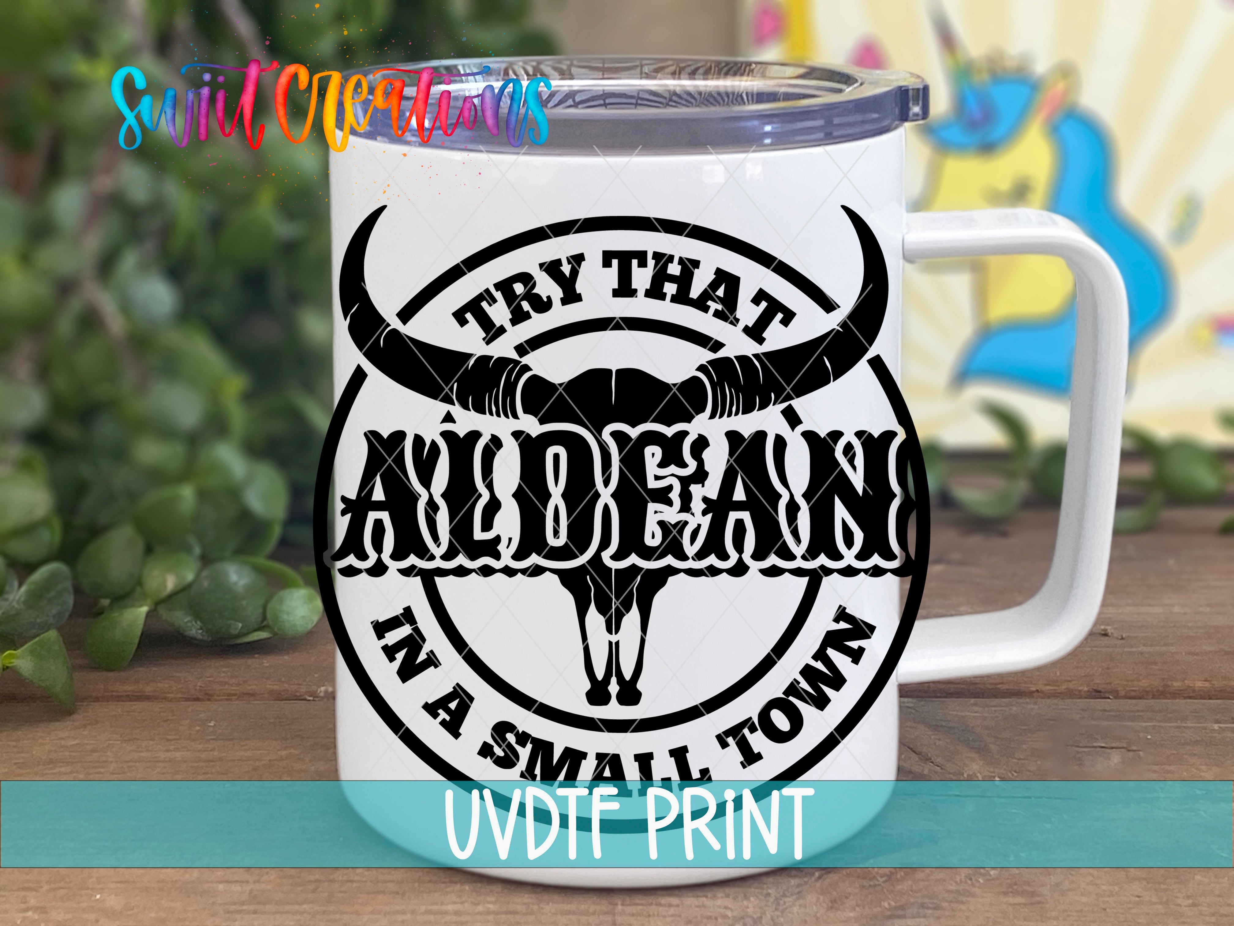 a white coffee mug with an image of a bull's head on it