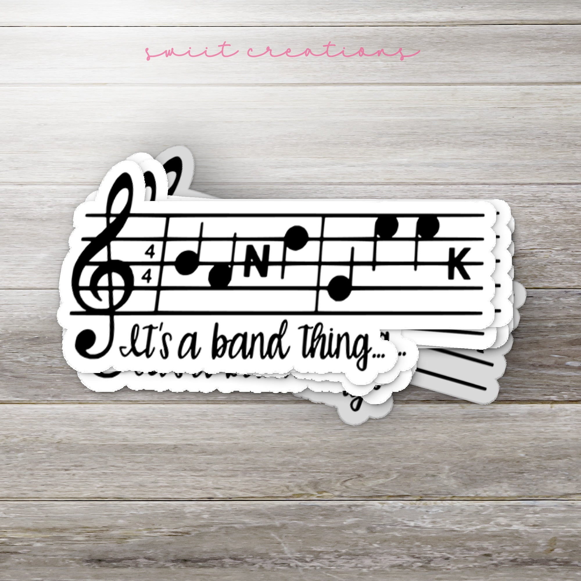 a pair of stickers that say it's a band thing