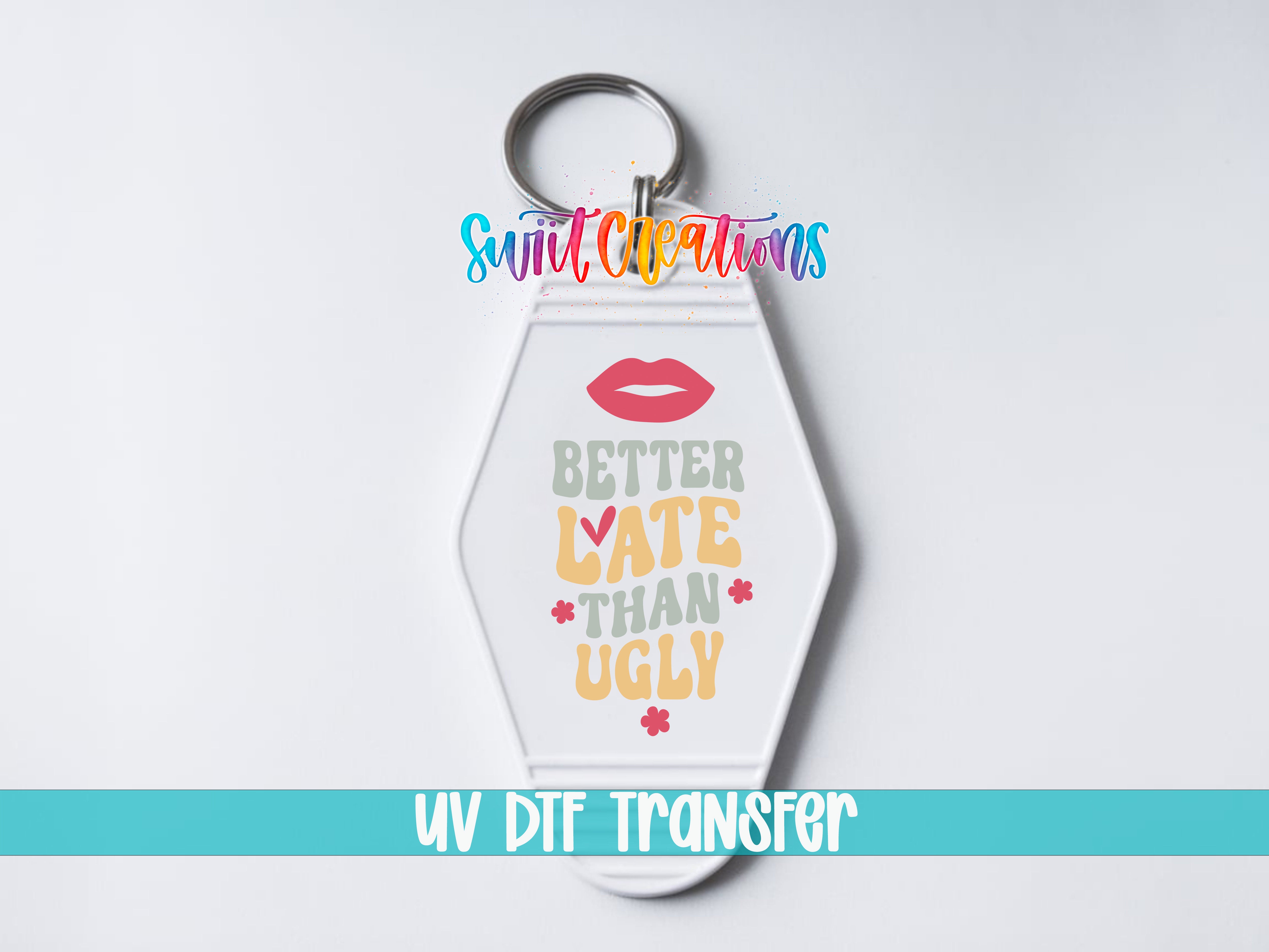 A keychain with a colorful design featuring the text "Better Late Than Ugly" and a red heart symbol.