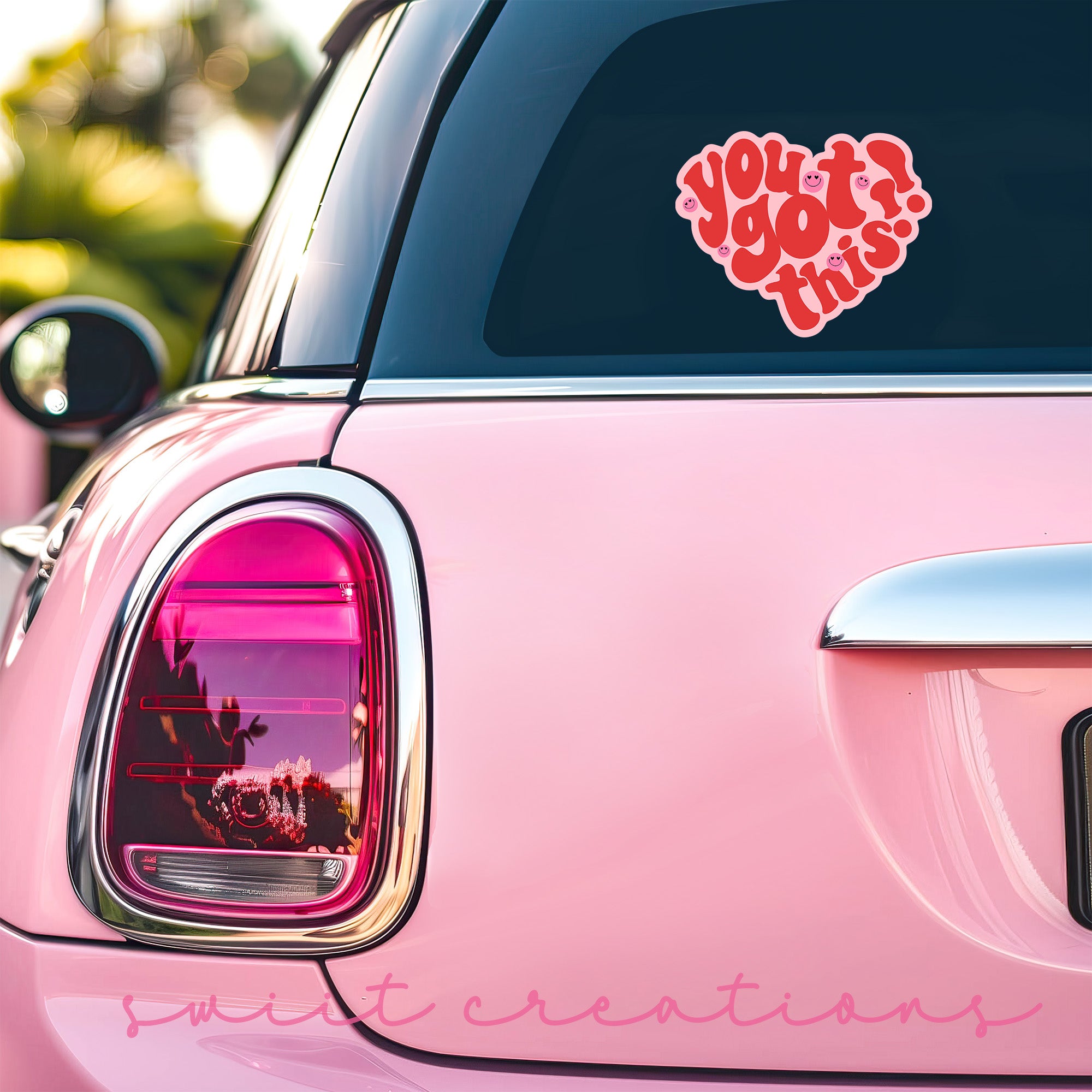 a pink car with a sticker that says you got this