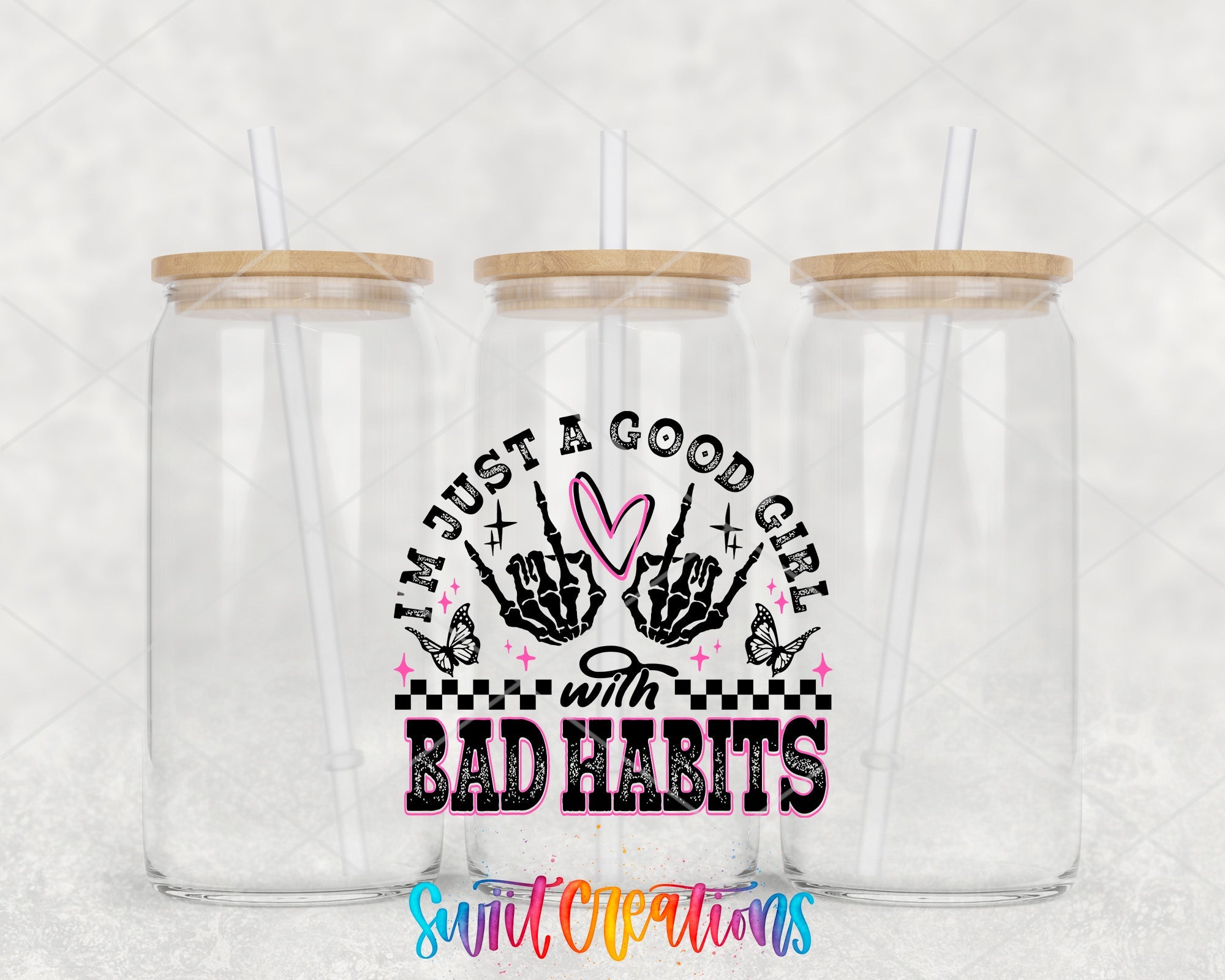 a couple of plastic cups with straws in them