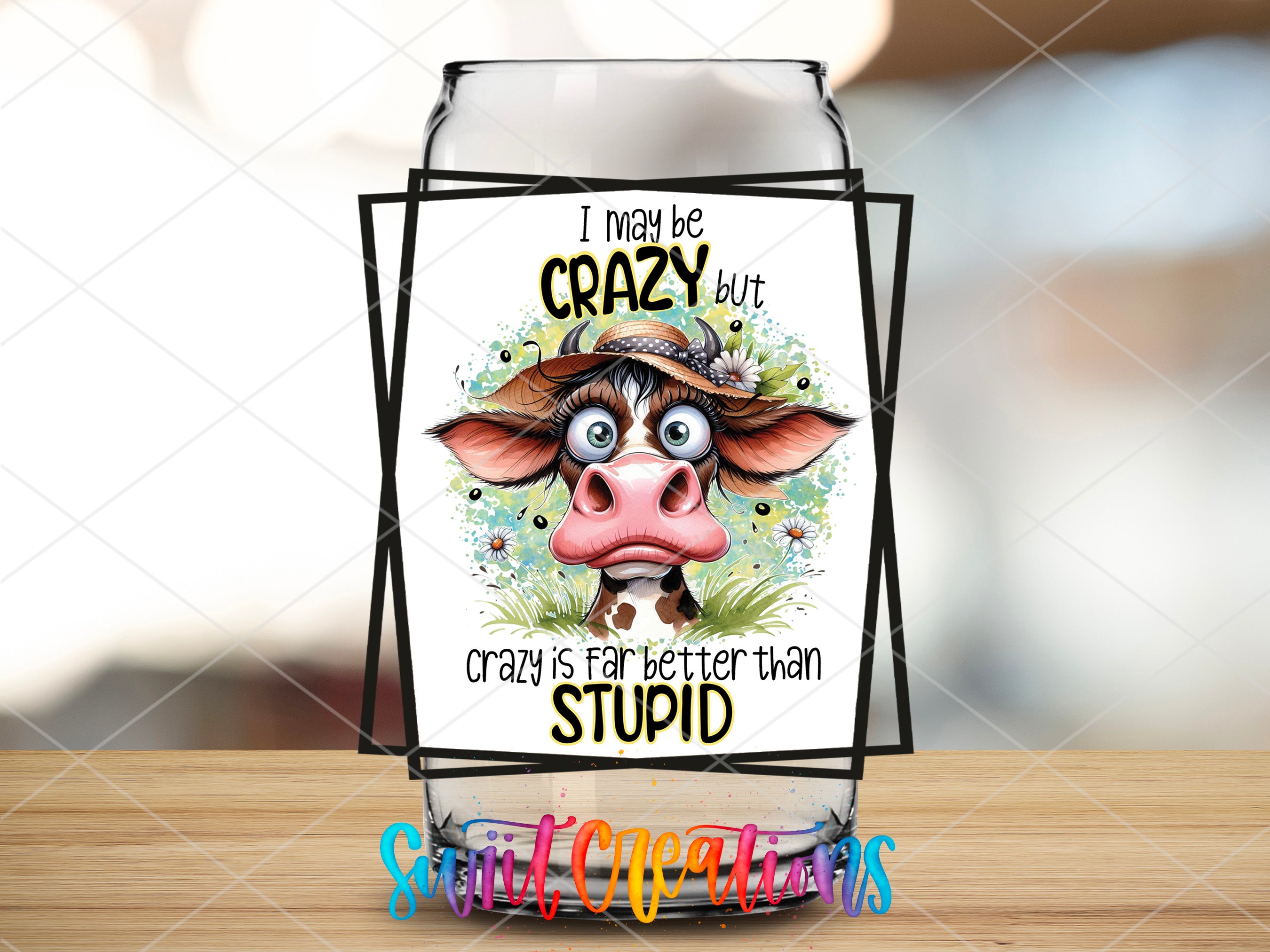 a card with a picture of a cow wearing a hat