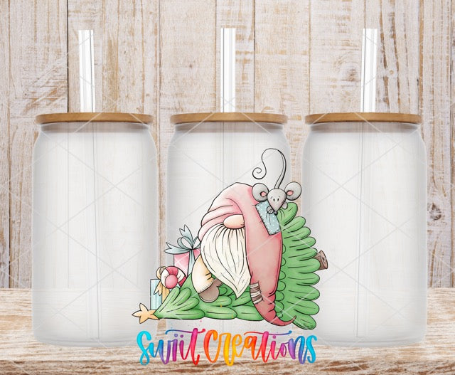 two coffee mugs with santa claus on them