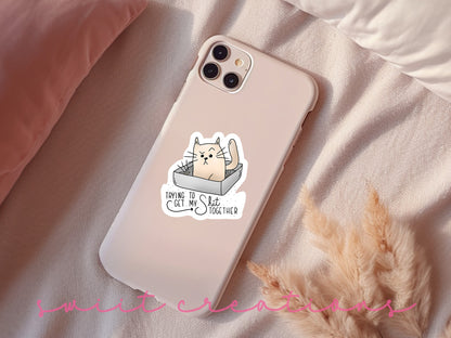 a phone case with a cat sticker on it