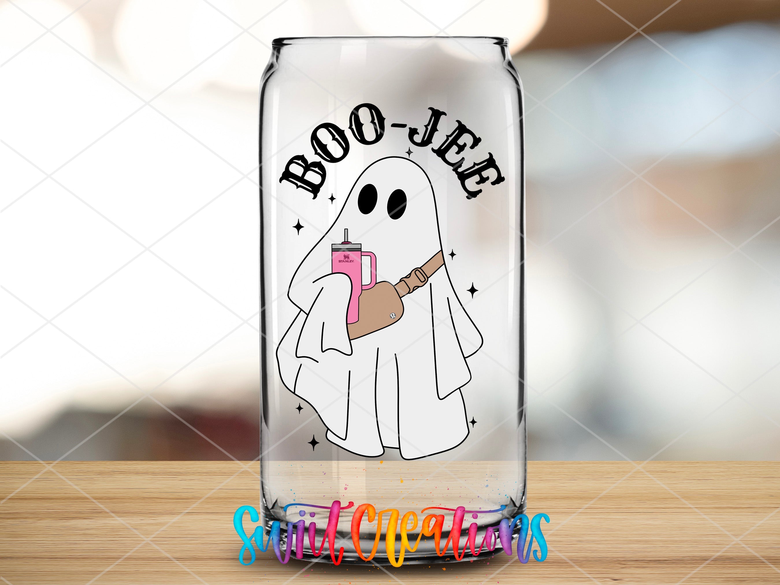 a glass with a ghost holding a drink
