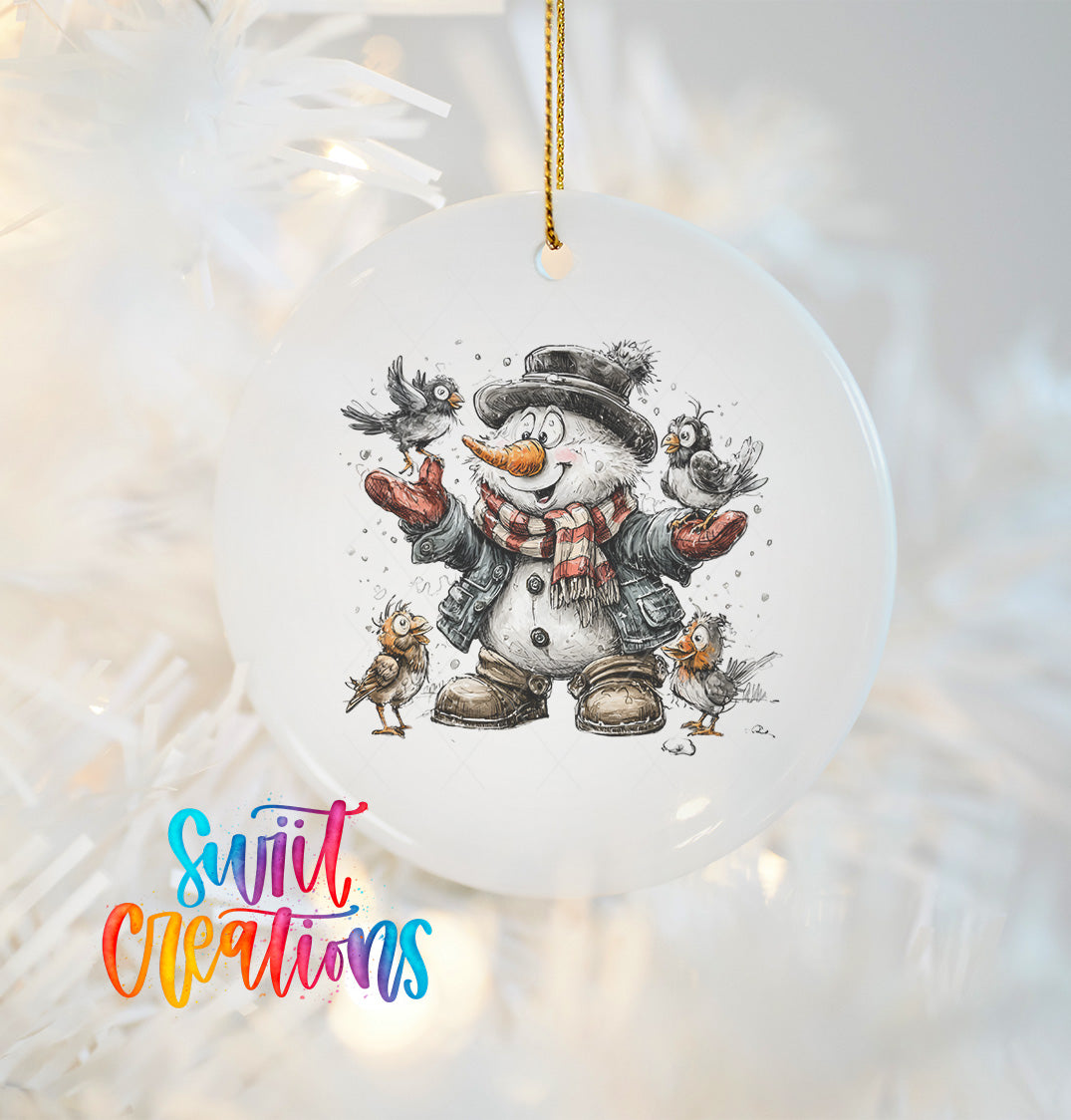 A snowman ornament with a bird perched on its nose, surrounded by other birds, is hanging on a Christmas tree.
