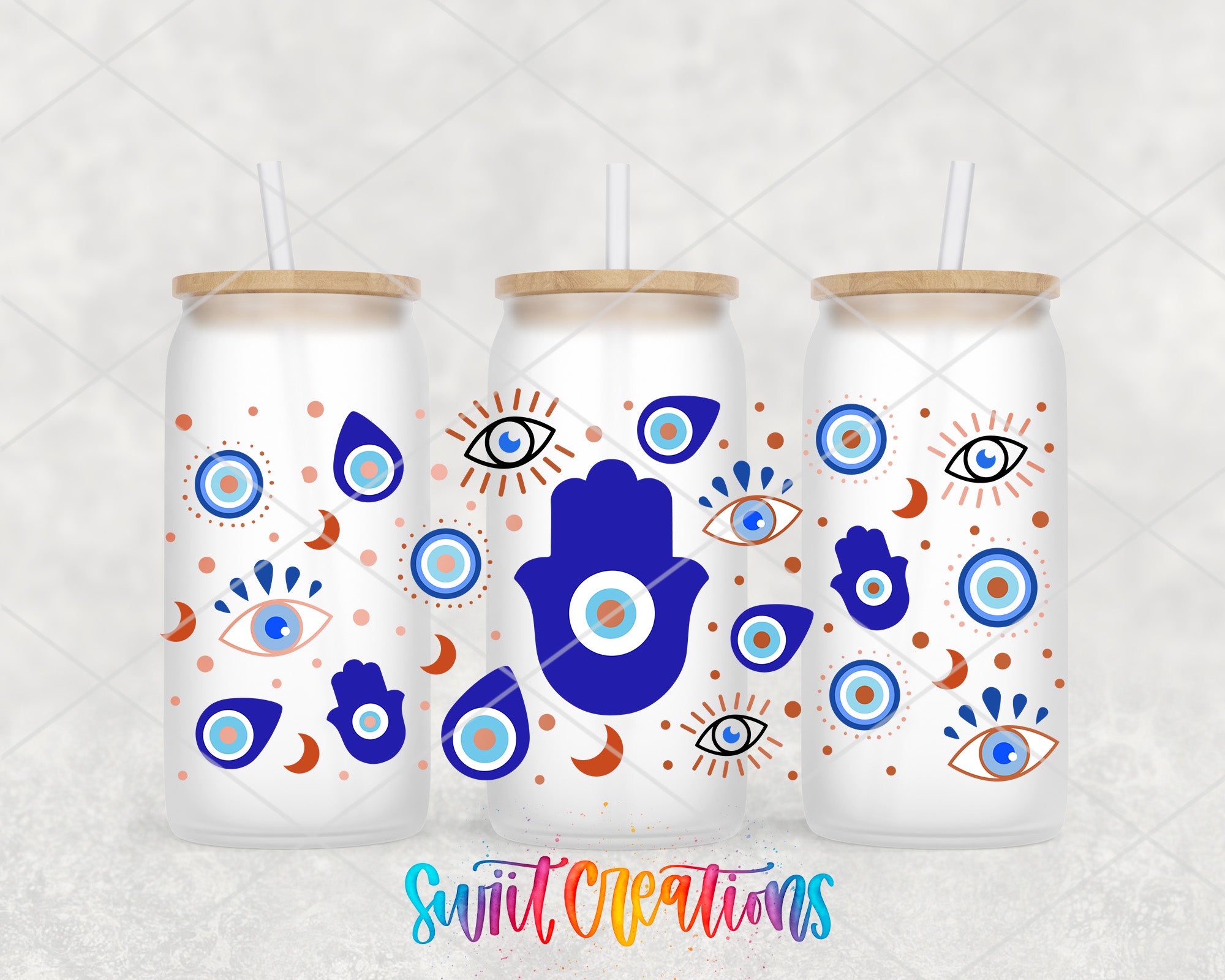three white tumblers with blue and orange eye designs and a hand of Hamsa motif.