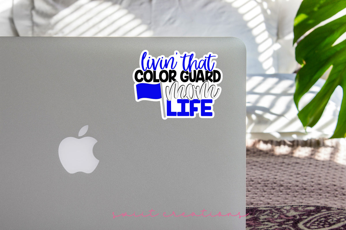 Livin' That Color Guard Mom Life sticker on the lid of a silver laptop