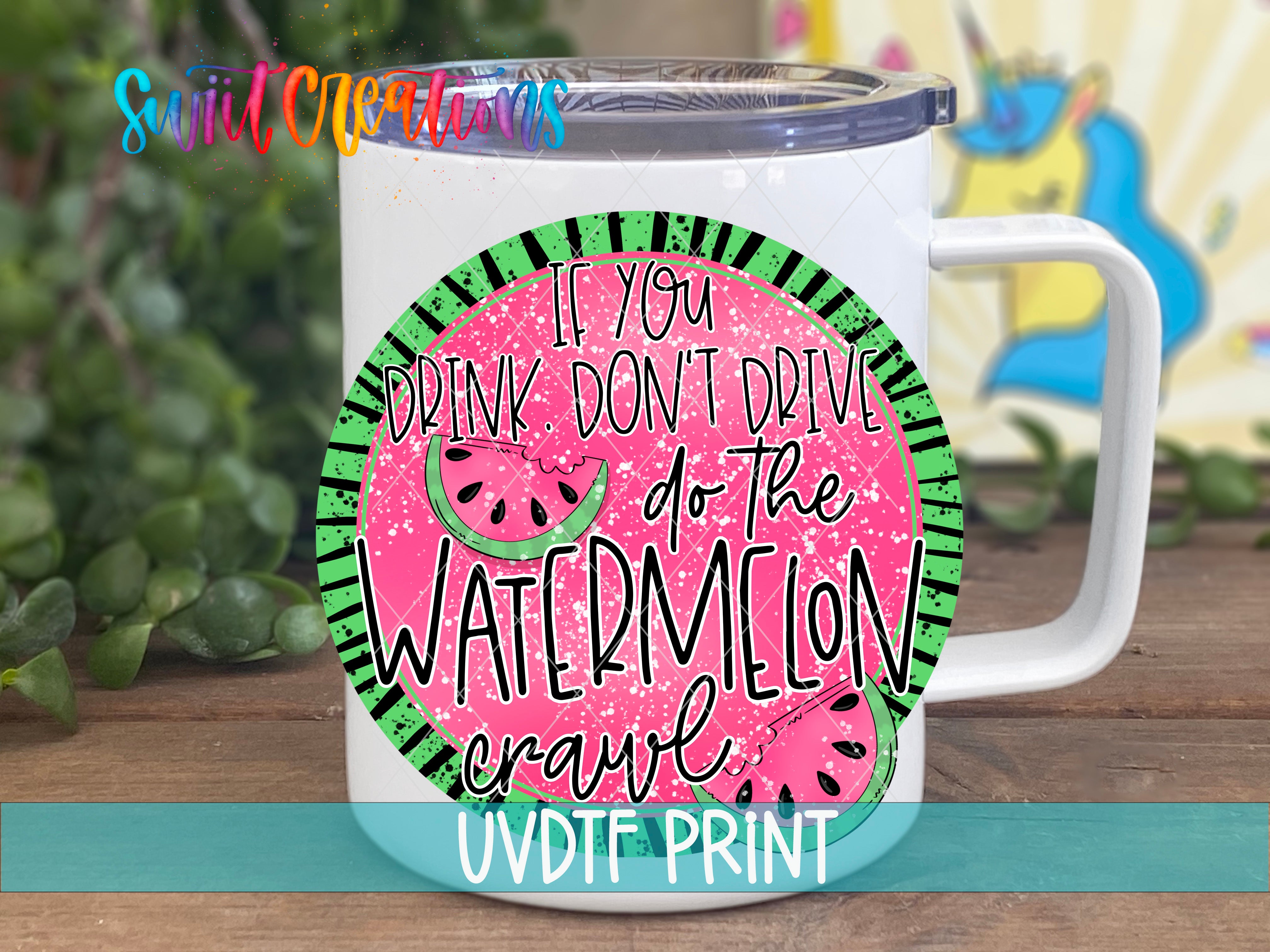 a white coffee mug with a watermelon print on it