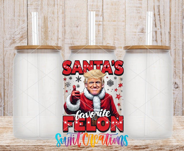 two coffee mugs with santa's favorite felon on them