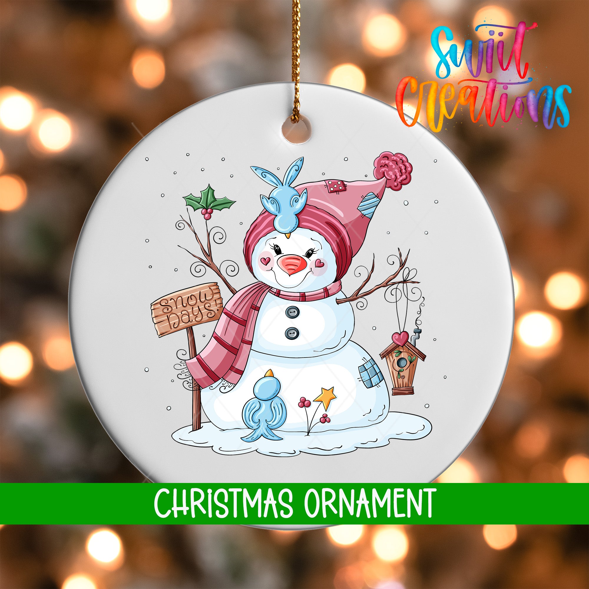 A snowman ornament with a sign that says "Snow days" and a bird perched on its head, surrounded by snow and holiday decorations.
