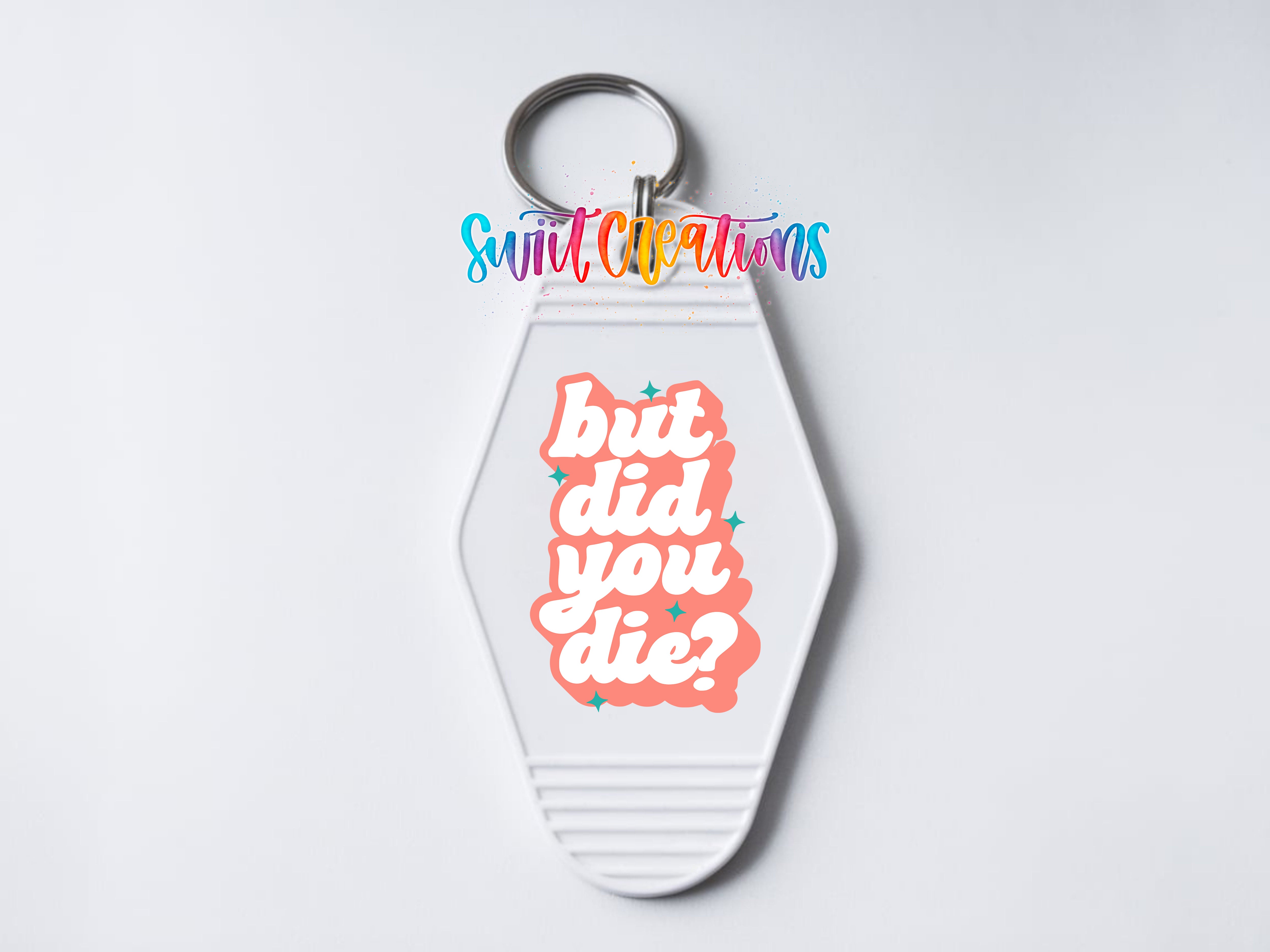 A keychain with a keyring and a colorful graphic design featuring the text "but did you die?"
