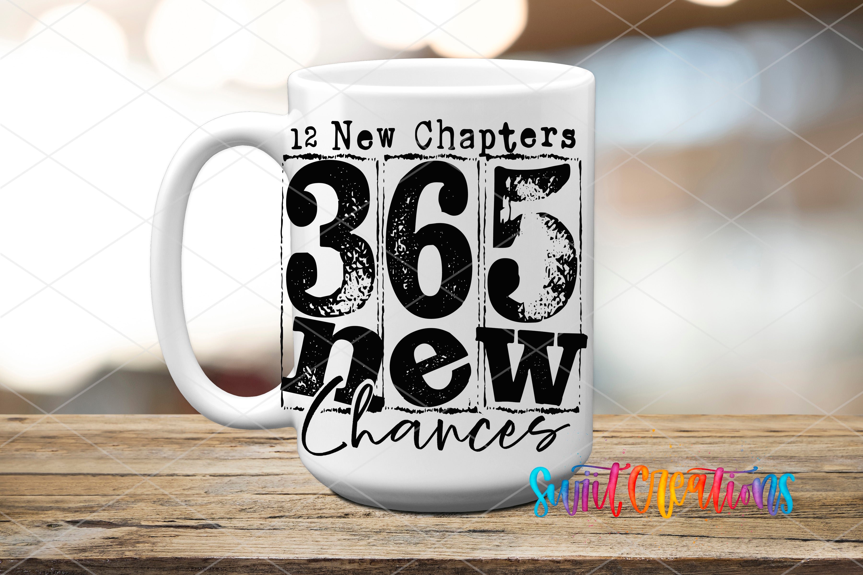 A white mug with the text "12 New Chapters 365 new Chances" printed on it, along with the number "365" and the word "new" in a bold font.