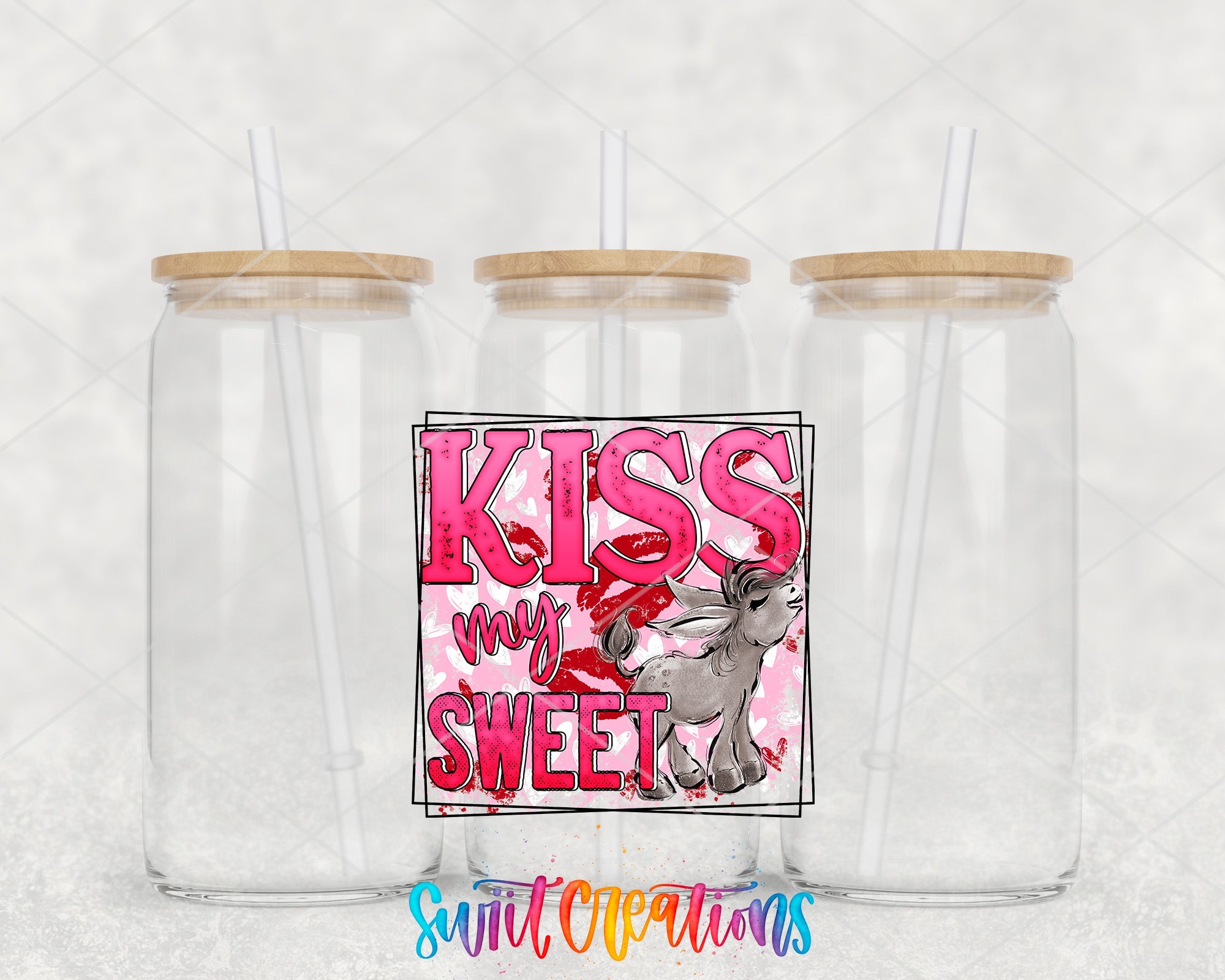 a couple of glass jars sitting on top of a table