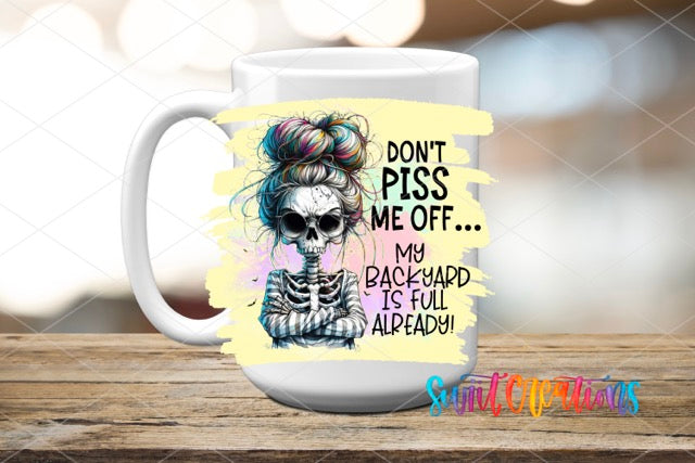 a white coffee mug with a skeleton on it