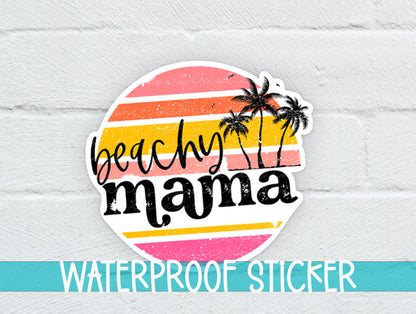 Beachy Mama sticker on a white brick background with a waterproof sticker banner