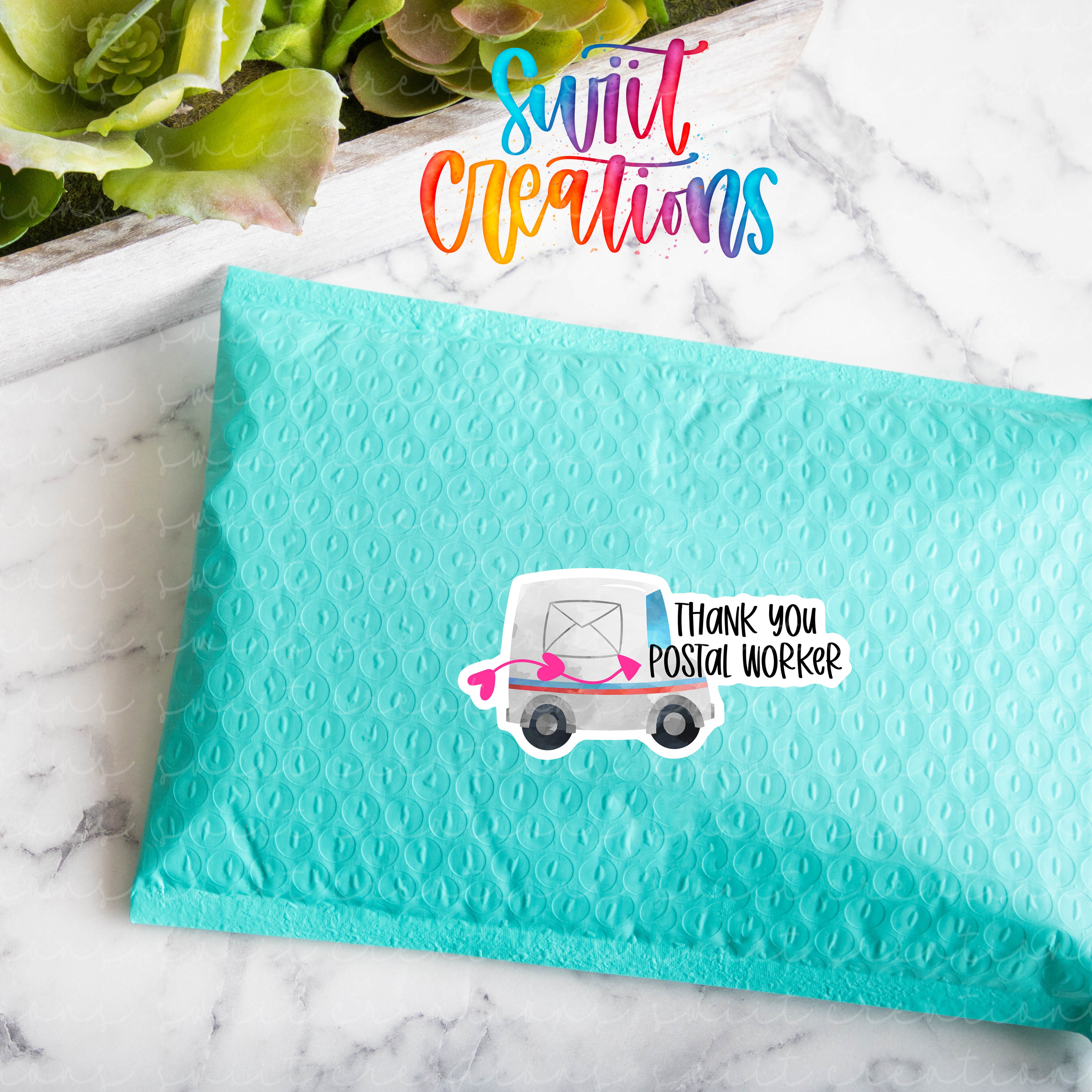 a blue envelope with a sticker on it