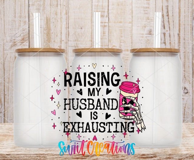 two coffee mugs with saying raising my husband is exhausting