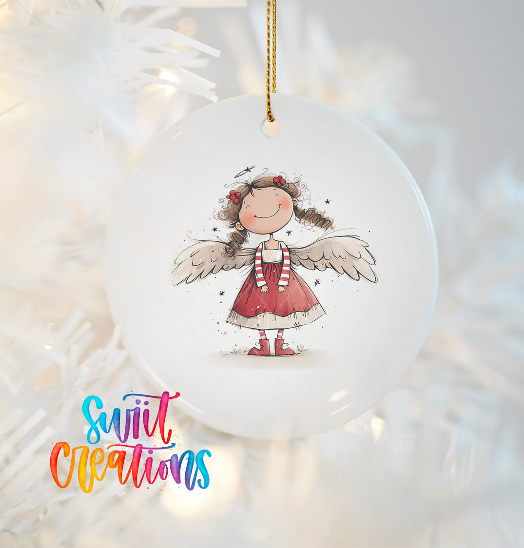 A white ceramic ornament featuring a smiling girl with wings, hanging on a string.