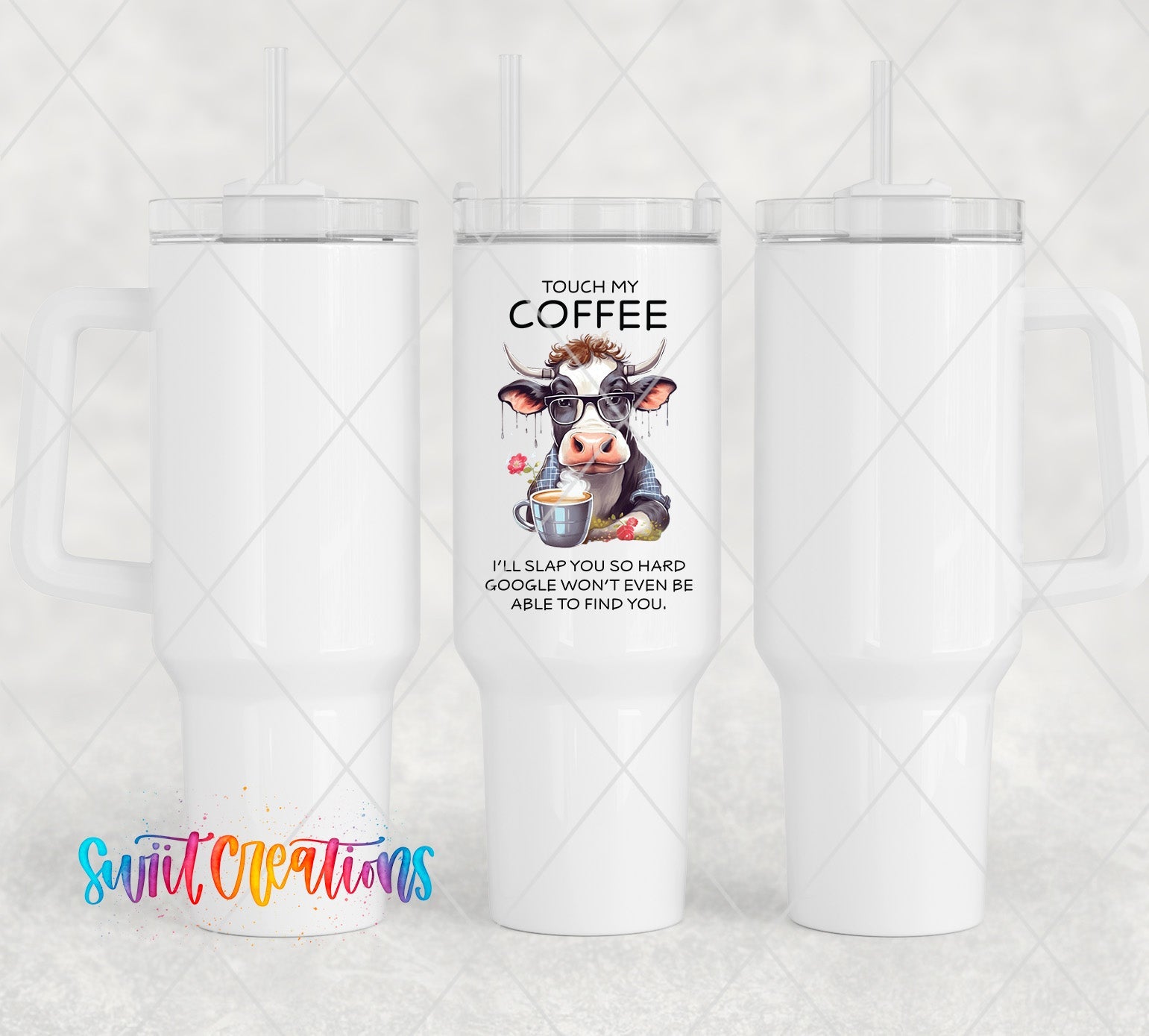 a white coffee cup with a picture of a cow on it