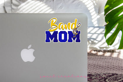 Gold and Blue Band Mom sticker on the lid of a silver laptop
