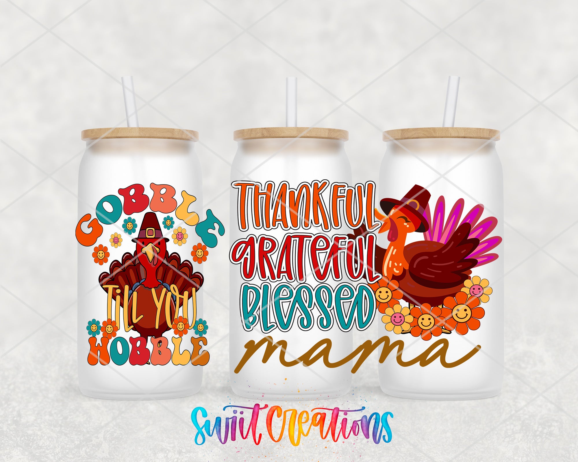 three colorful glass tumblers with Thanksgiving-themed designs and text.