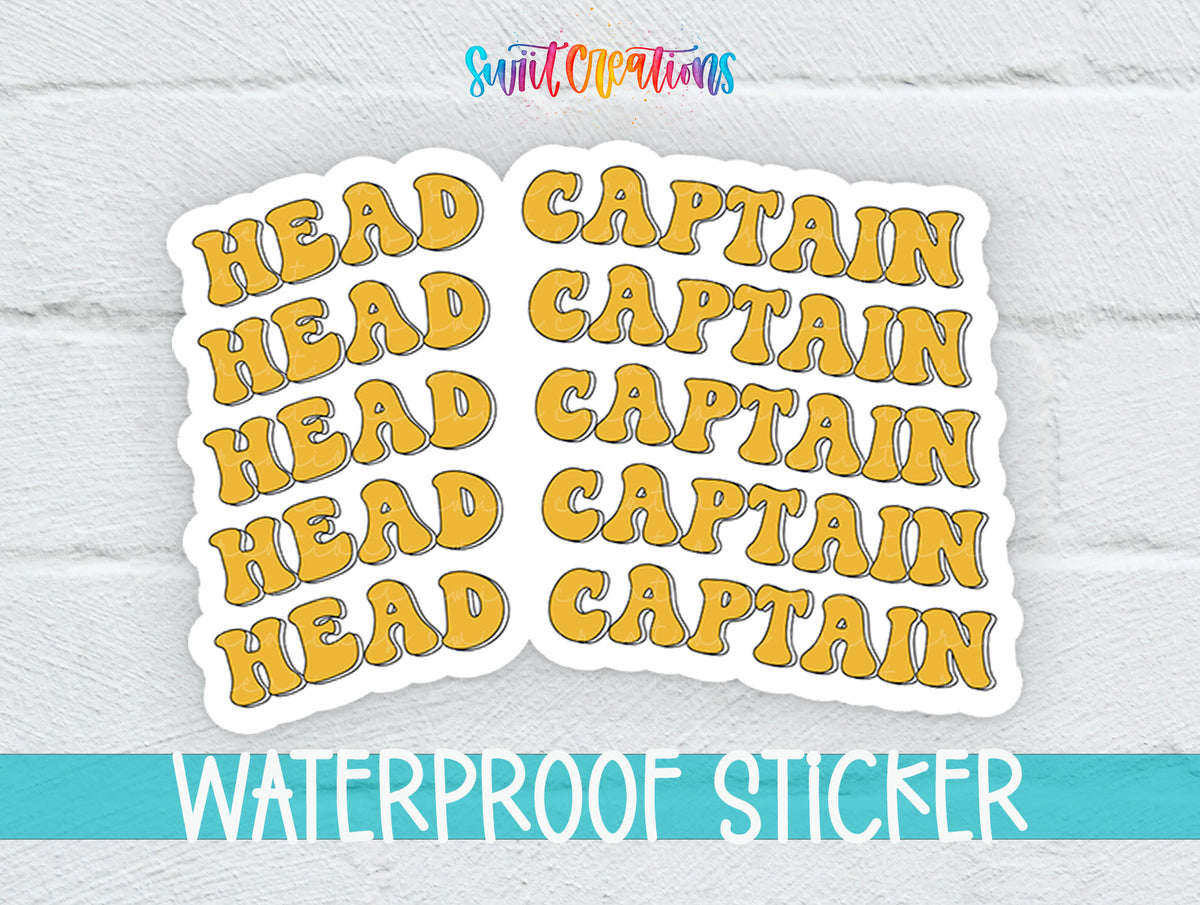 a sticker with the word "HEAD" repeated in a playful, artistic font.