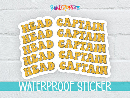 a sticker with the word "HEAD" repeated in a playful, artistic font.