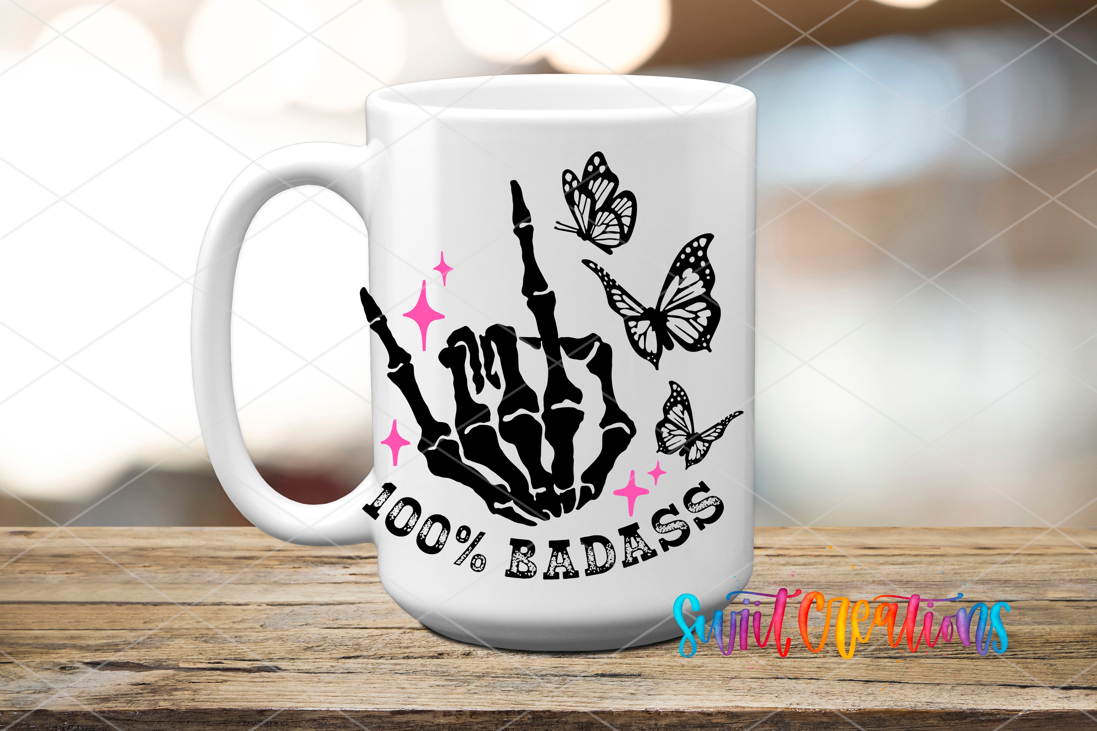 a white coffee mug with a black hand and butterflies on it