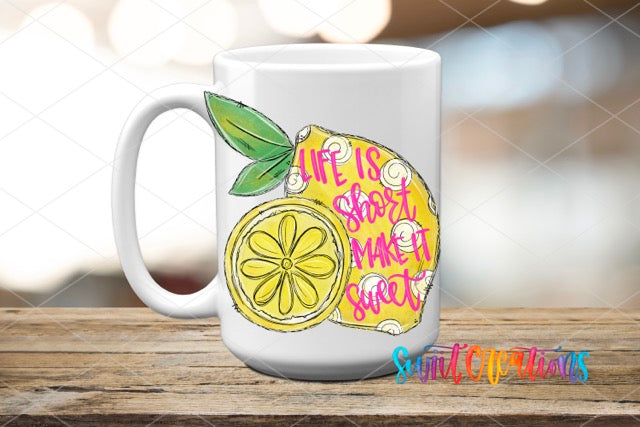 a white coffee mug with a lemon on it