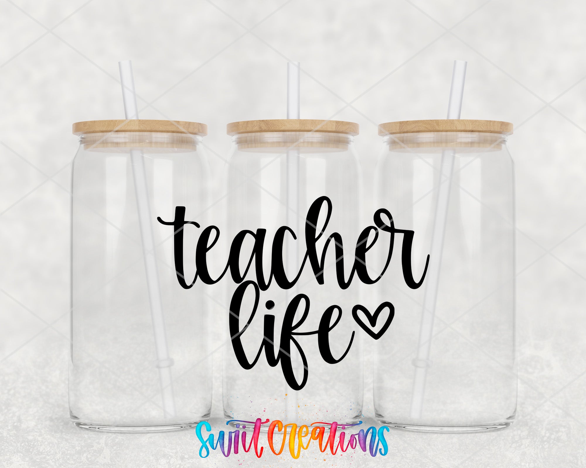 a couple of glass jars with the words teacher life on them