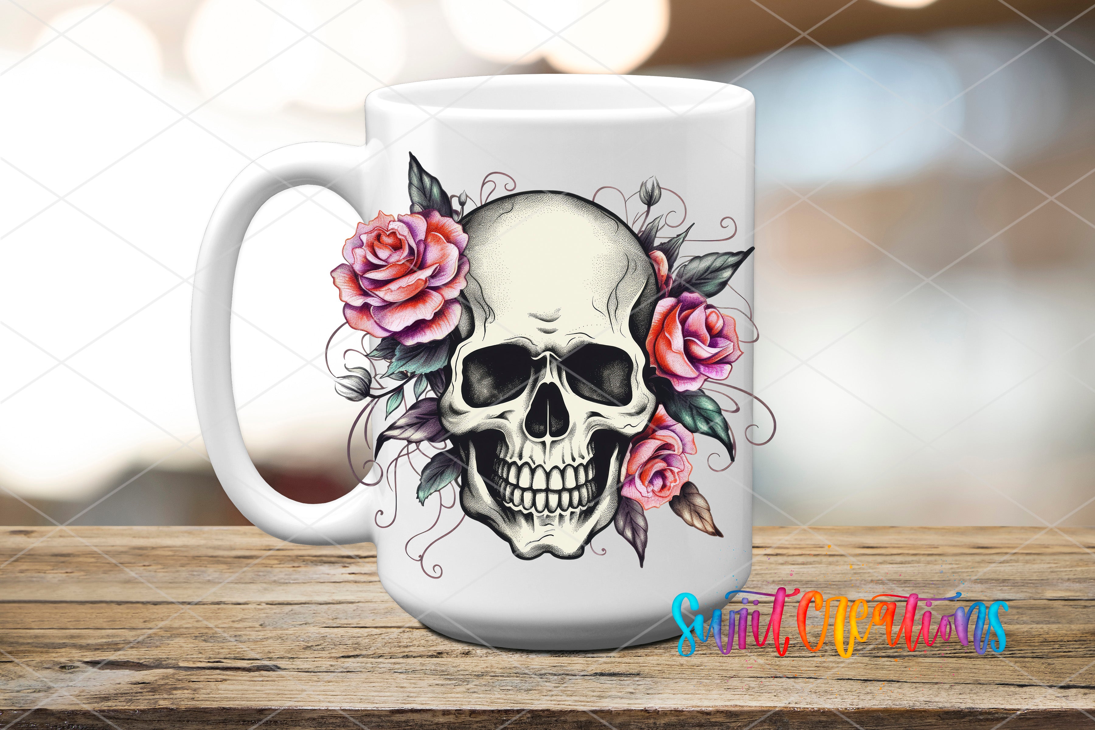 A white ceramic mug with a skull design and colorful flowers surrounding it, placed on a wooden surface.