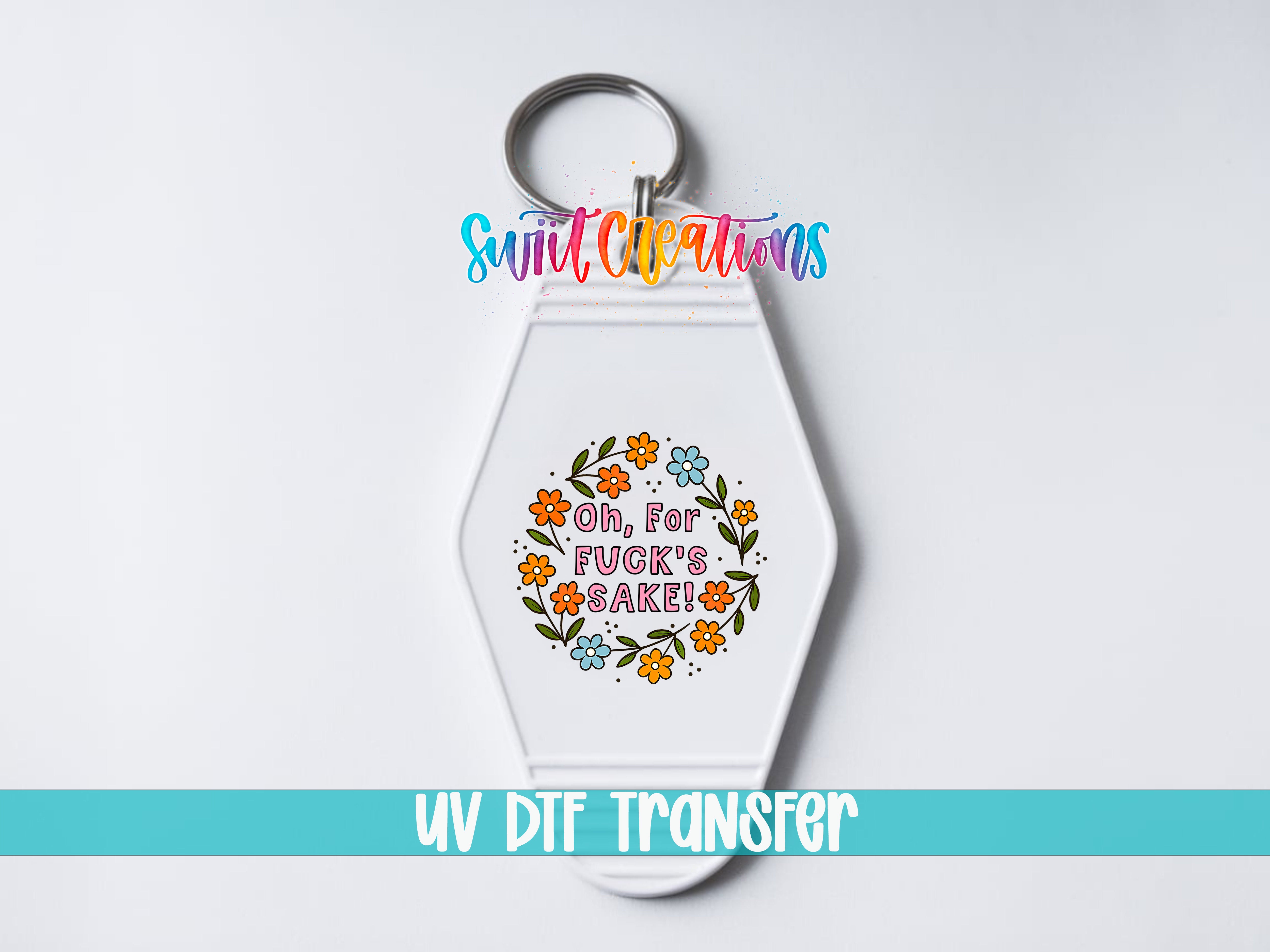 A keychain with a floral design and text on it, along with a UV dye transfer logo.