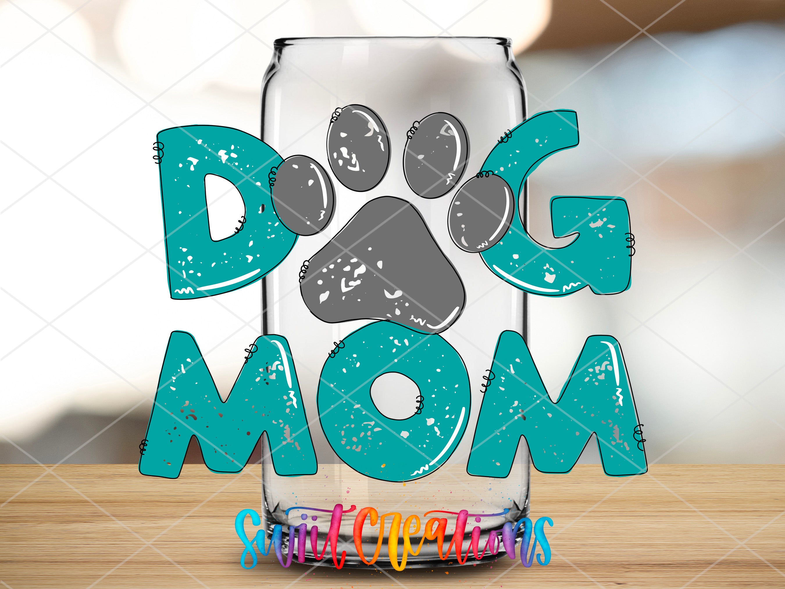 a glass with a dog's paw and the words dog mom on it
