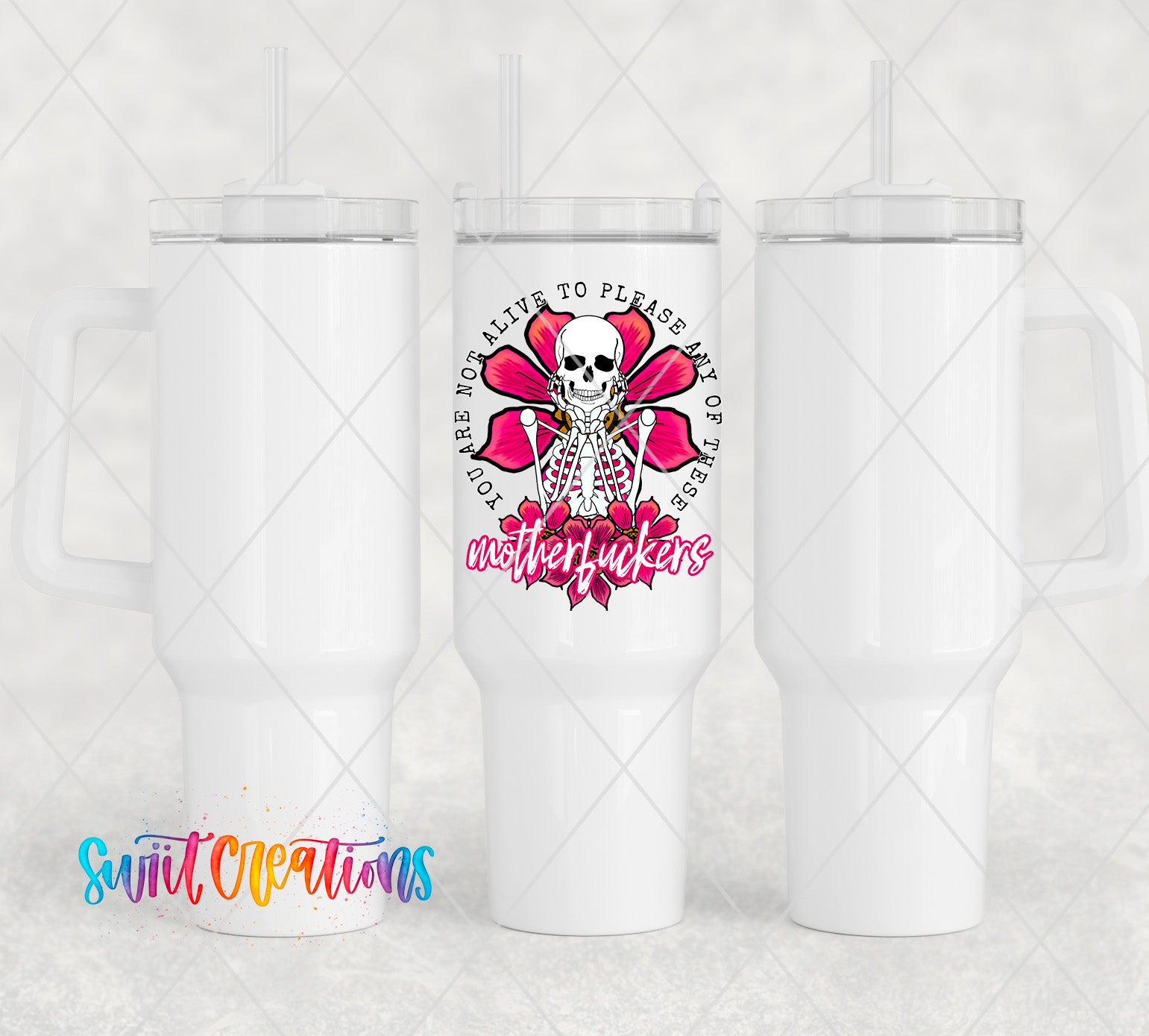 a white tumbler with a pink flower and a skull on it