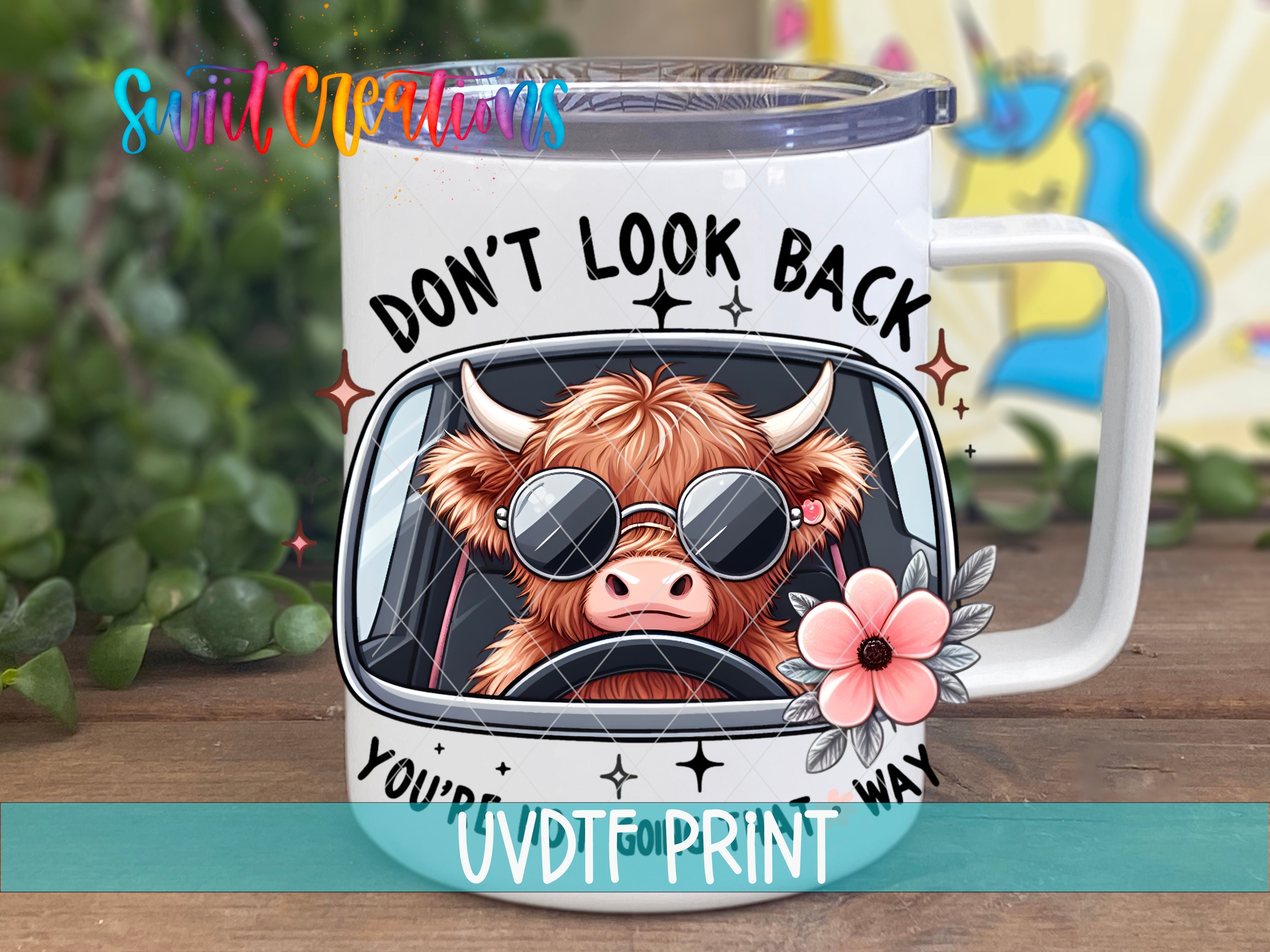a coffee mug with a picture of a cow wearing sunglasses