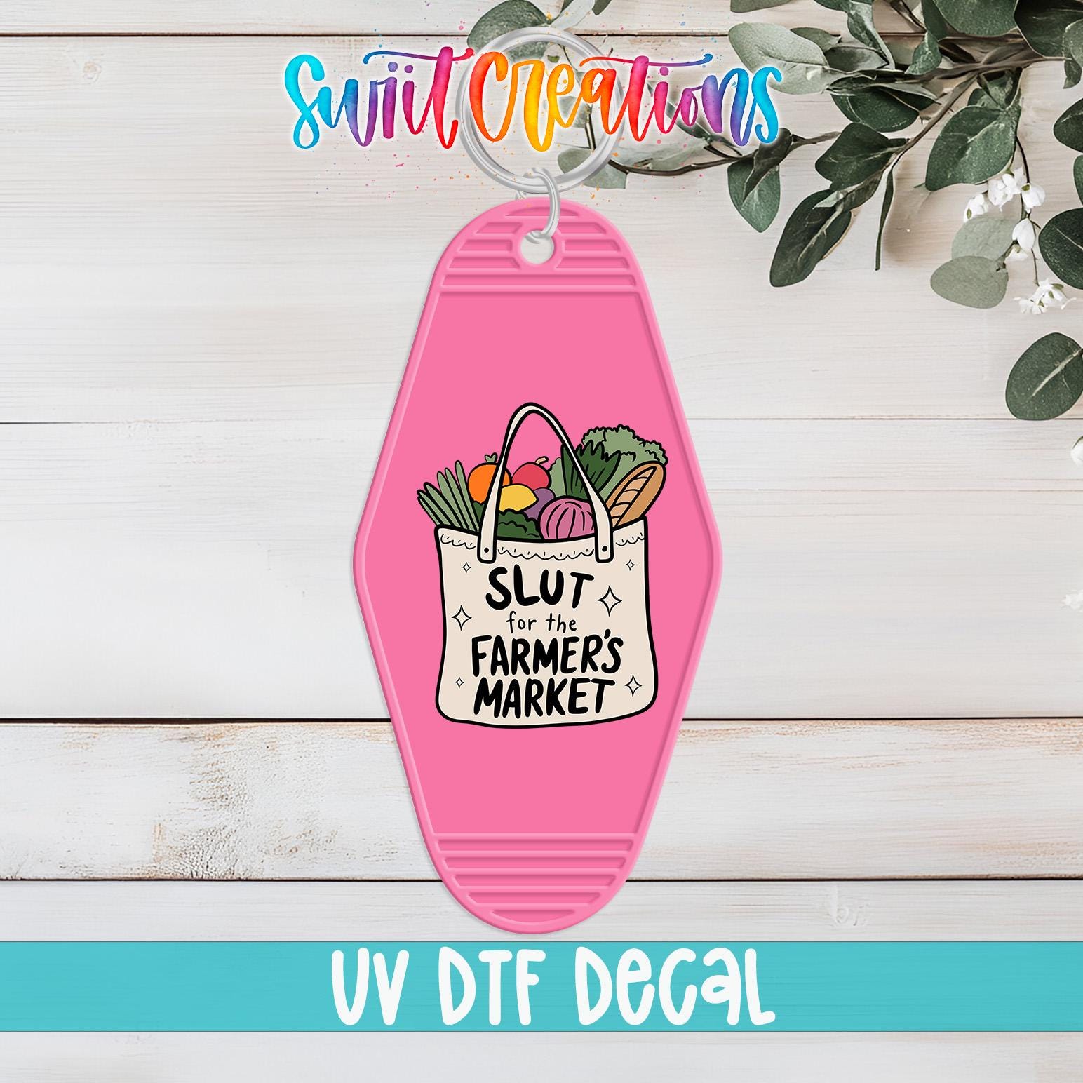 A pink keychain with a bag of vegetables and the text "SLUT for the FARMERS MARKET" printed on it.